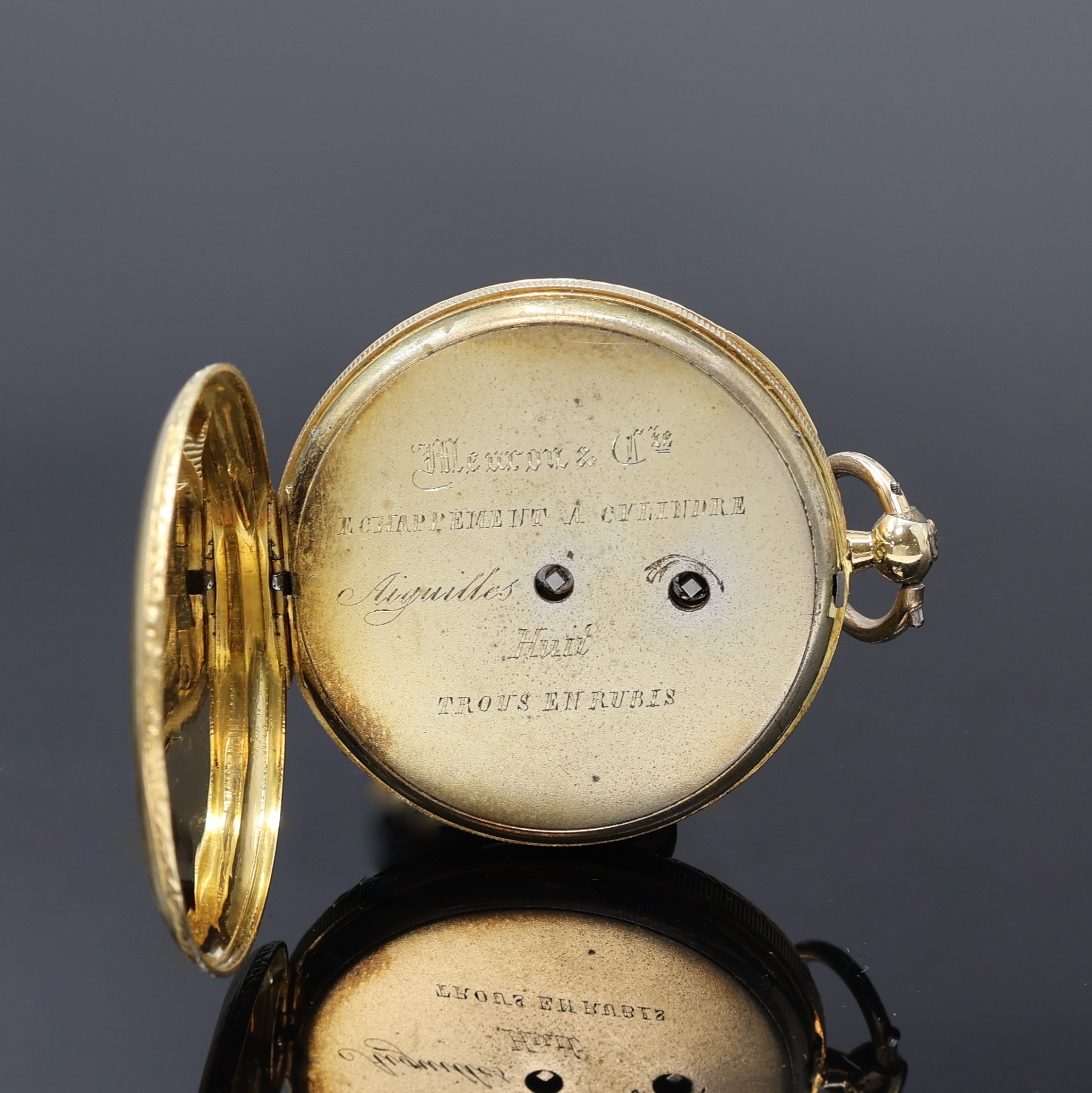 Detail c: Offene Taschenuhr in GG 750/000, Schweiz um 1880, floral grav. Geh. dell, seitl. geriffelt, Rückdeckel m. floraler Gravur, verg. Cuvette, ...