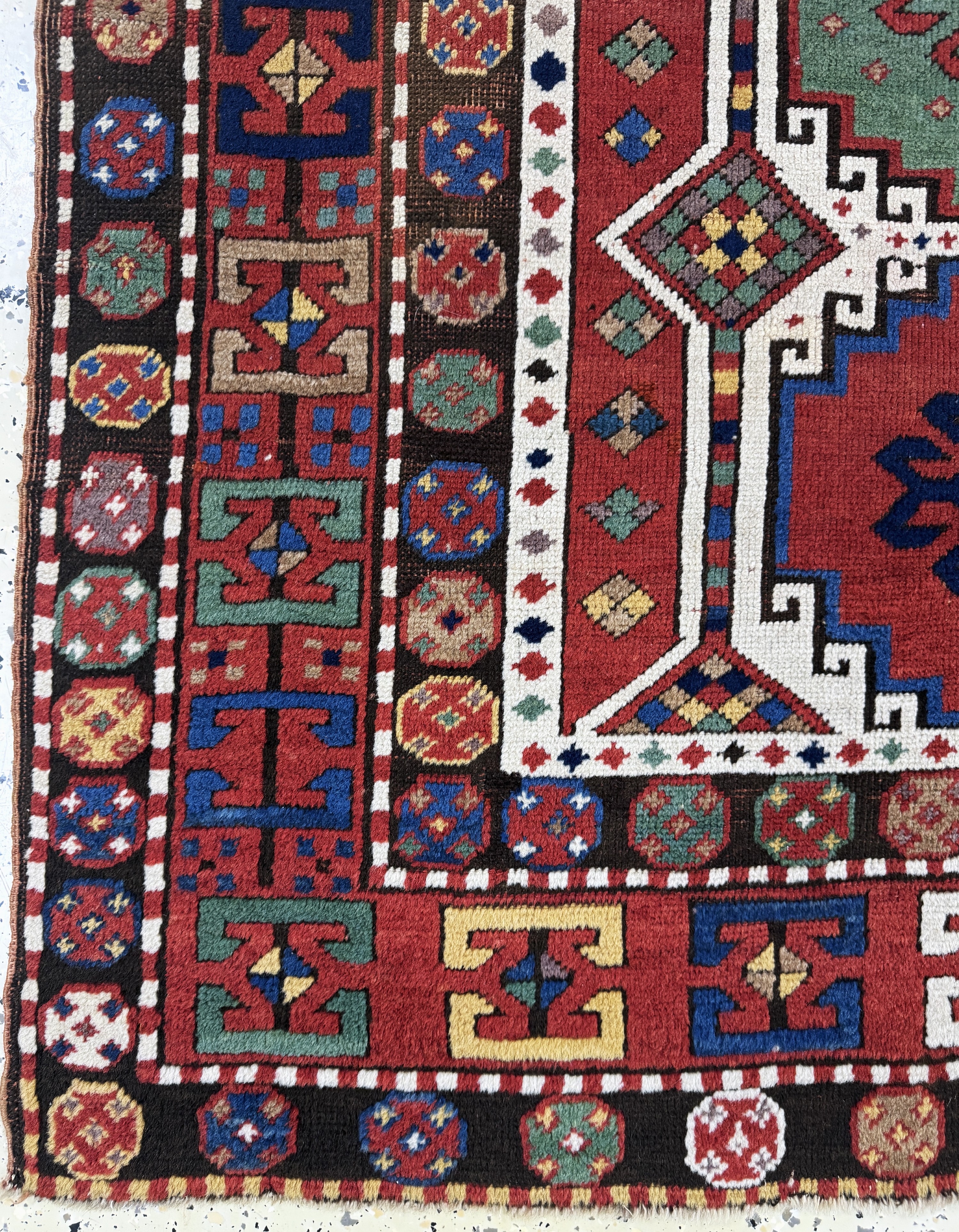 Detail b: Antiker Kazak, Kaukasus, 19.Jhd, Wolle auf Wolle, ca. 165 x 140 cm, EHZ: 2-3