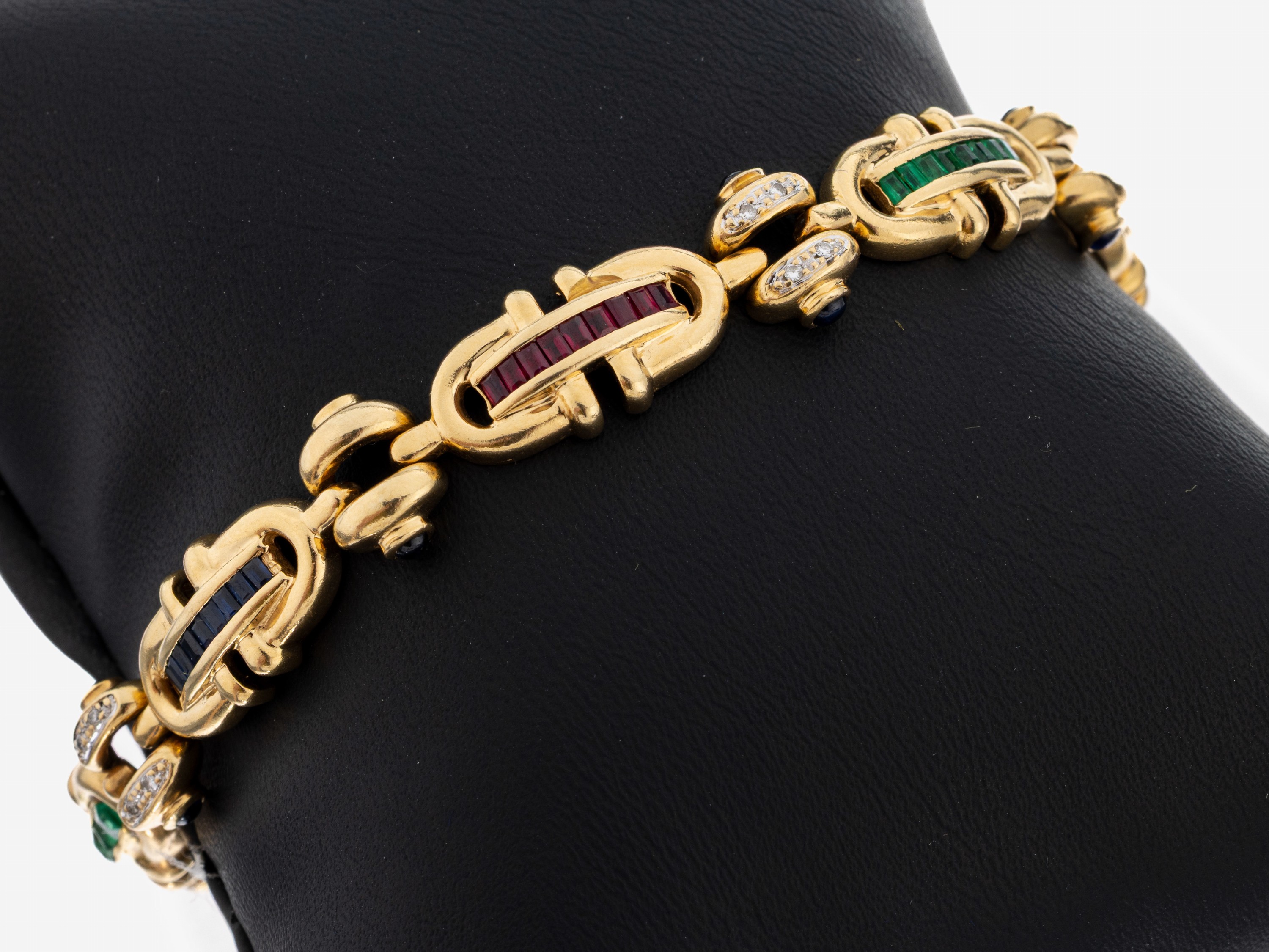 Image 27073136 - 14 kt Gold Saphir-Smaragd-Rubin-Brillant- Armband, GG 585/000, 27 Saphirbaguettes und ...