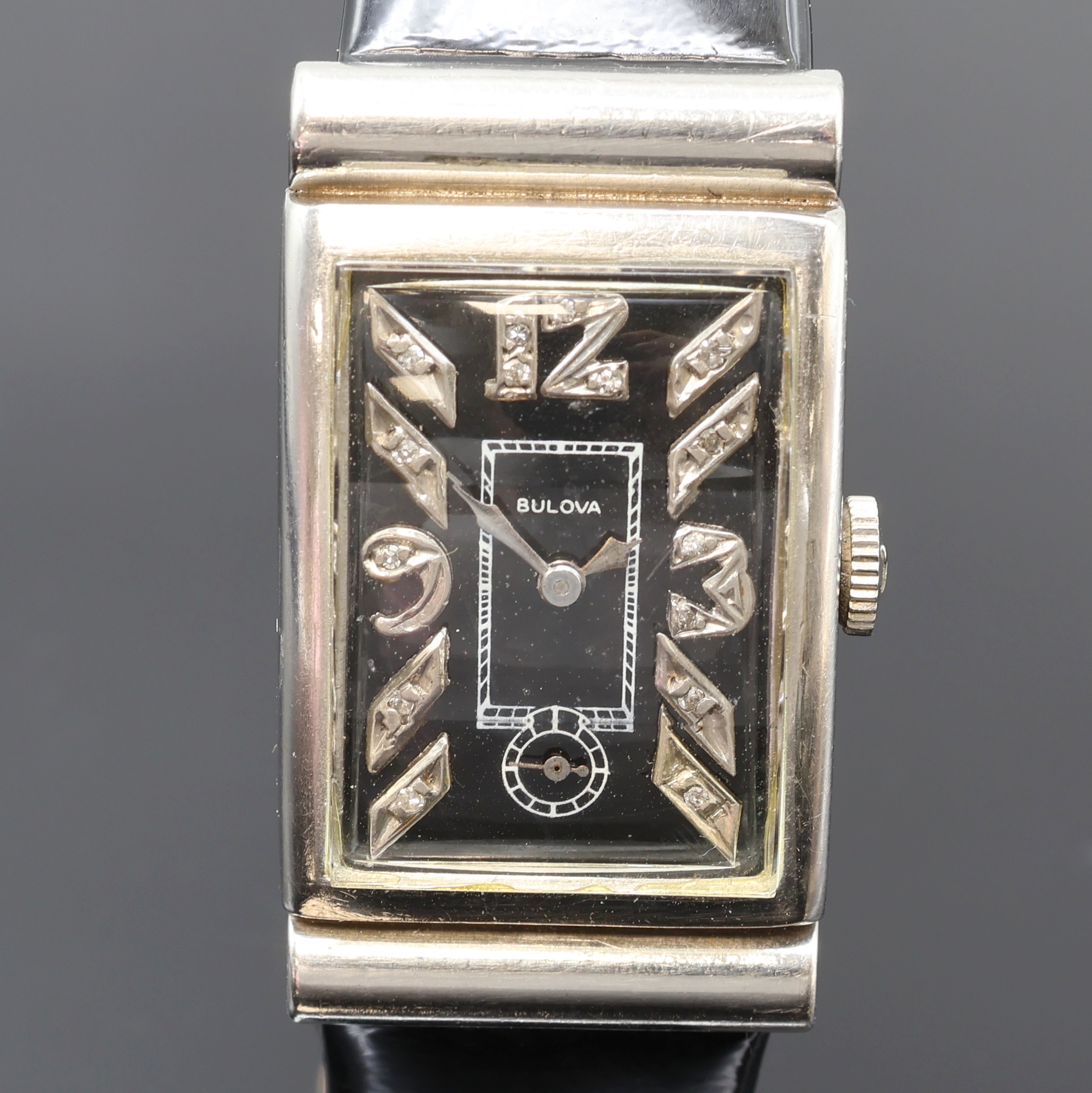Detail a: BULOVA seltene Cocktailwatch, USA um 1940, Handaufzug, 2-teil. Palladium-geh. m. verd. Bandanstößen, Boden aufgedr., schwarzes Zifferblatt m. in WG ...