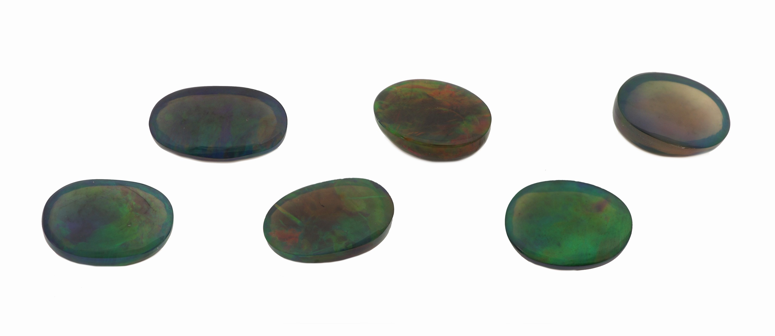 Detail a: Lot 6 lose Schwarzopale, zus. ca. 19.07 ct, ovale Cabochons in versch. Größen