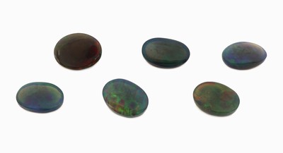 27076241a - Lot 6 lose Schwarzopale, zus. ca. 18.07 ct, ovale Cabochons in versch. Größen ...