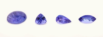 Image Lot 4 loose tanzanites , total approx. 11.22ct: 1 x oval cabochon approx. 6.74 ct; 1 x ...