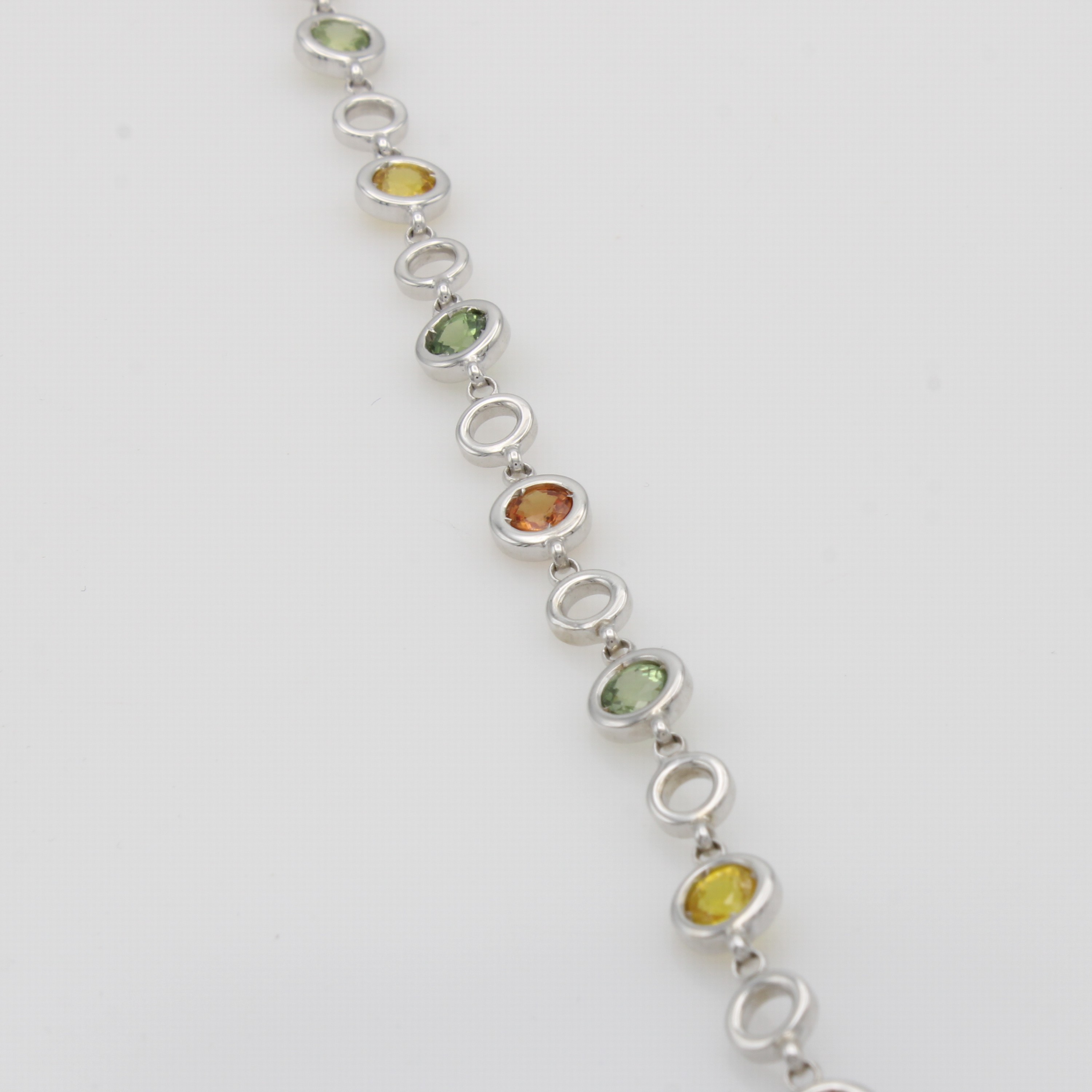 Image 27079207 - Armband mit Saphiren, WG 590/000, 9 bunte Saphire zus. ca. 4 ct, Karabinerschl., L. ca. ...