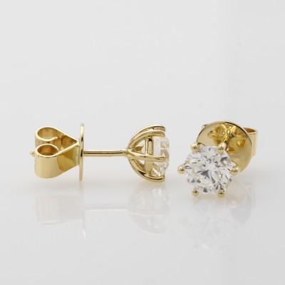 27079555a - Paar Ohrstecker mit Brillantsolitären, GG 750/000, 2 Brill. in Krappenfassung zus. 2 ct ...