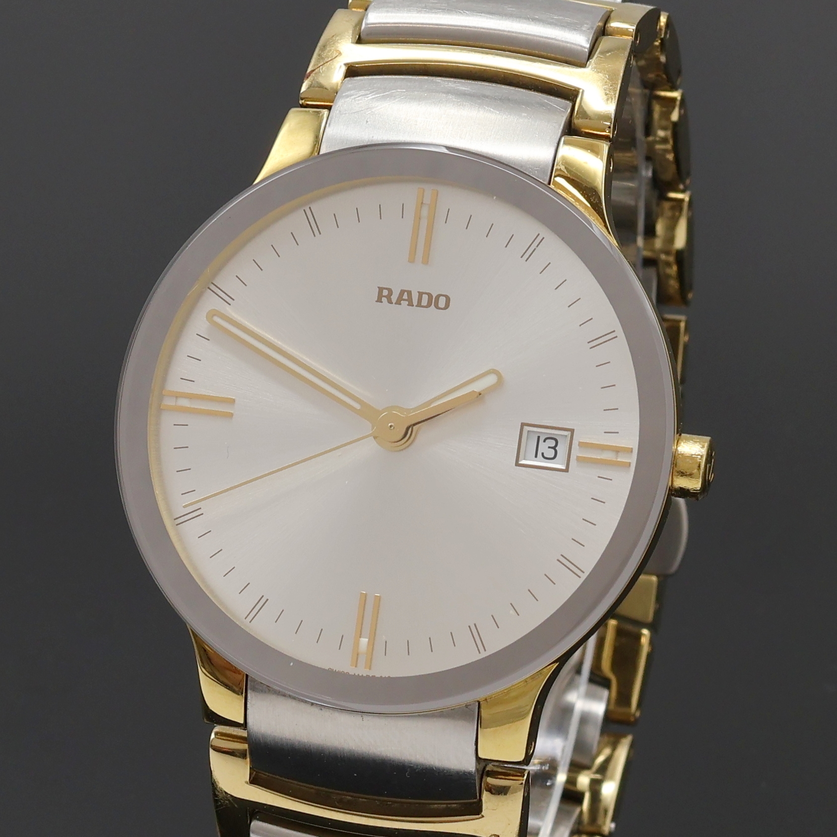 Detail a: RADO Centrix Herrenarmbanduhr Referenz 115.0931.1, Schweiz um 2010, quarz, verg. Geh. inkl. orig. Gliederband m. dopp. Titan- Faltschl., Stahlboden ...