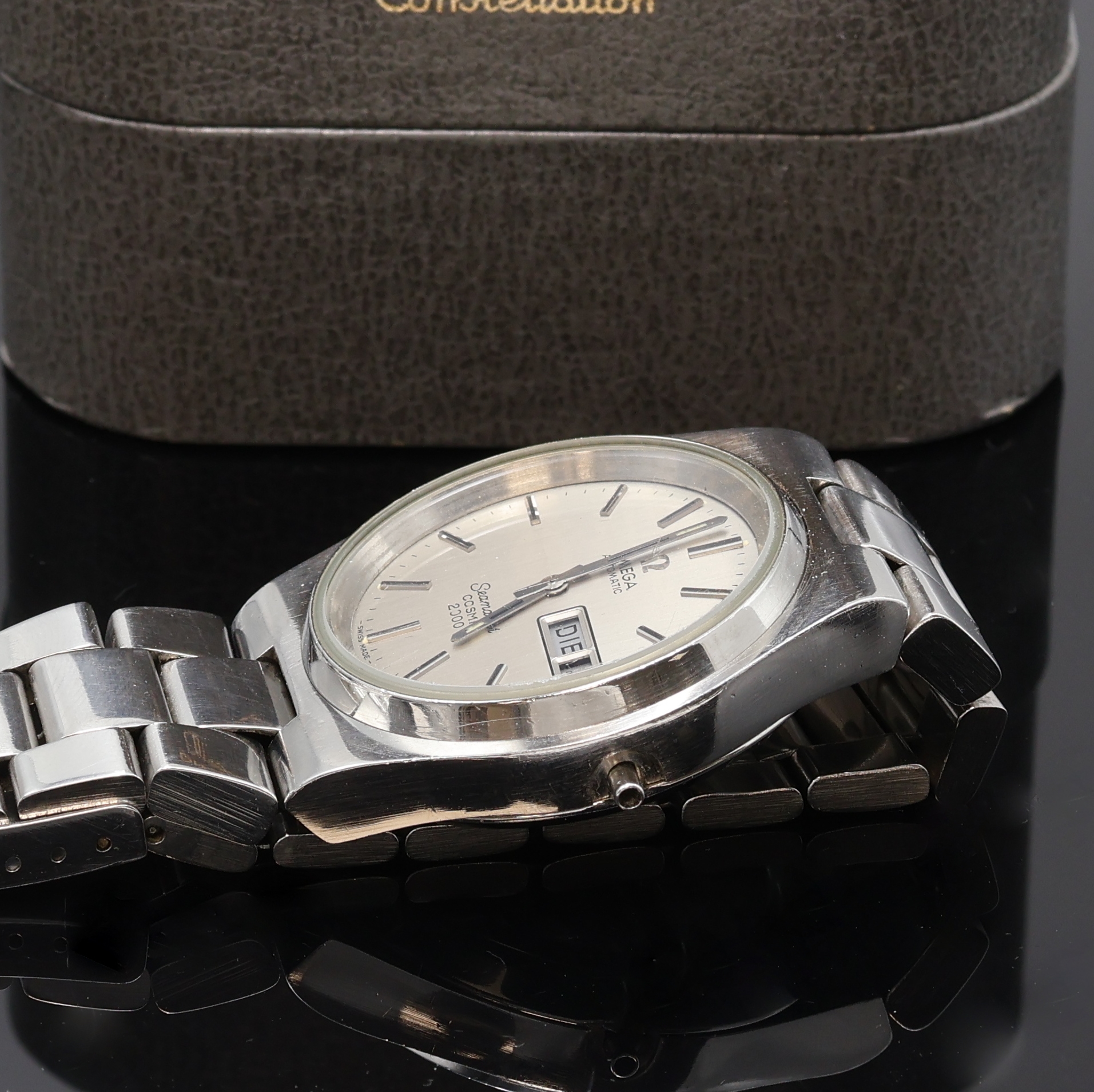 Detail c: OMEGA Herrenarmbanduhr Seamaster Cosmic 2000 in Stahl, Schweiz um 1975, Automatik, Stülpgeh. inkl. orig. Gliederband m. Faltschl., silb. Zifferbl. ...