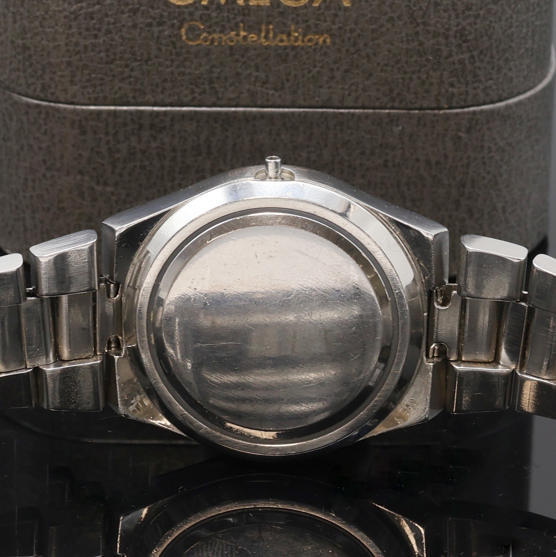 Detail d: OMEGA Herrenarmbanduhr Seamaster Cosmic 2000 in Stahl, Schweiz um 1975, Automatik, Stülpgeh. inkl. orig. Gliederband m. Faltschl., silb. Zifferbl. ...
