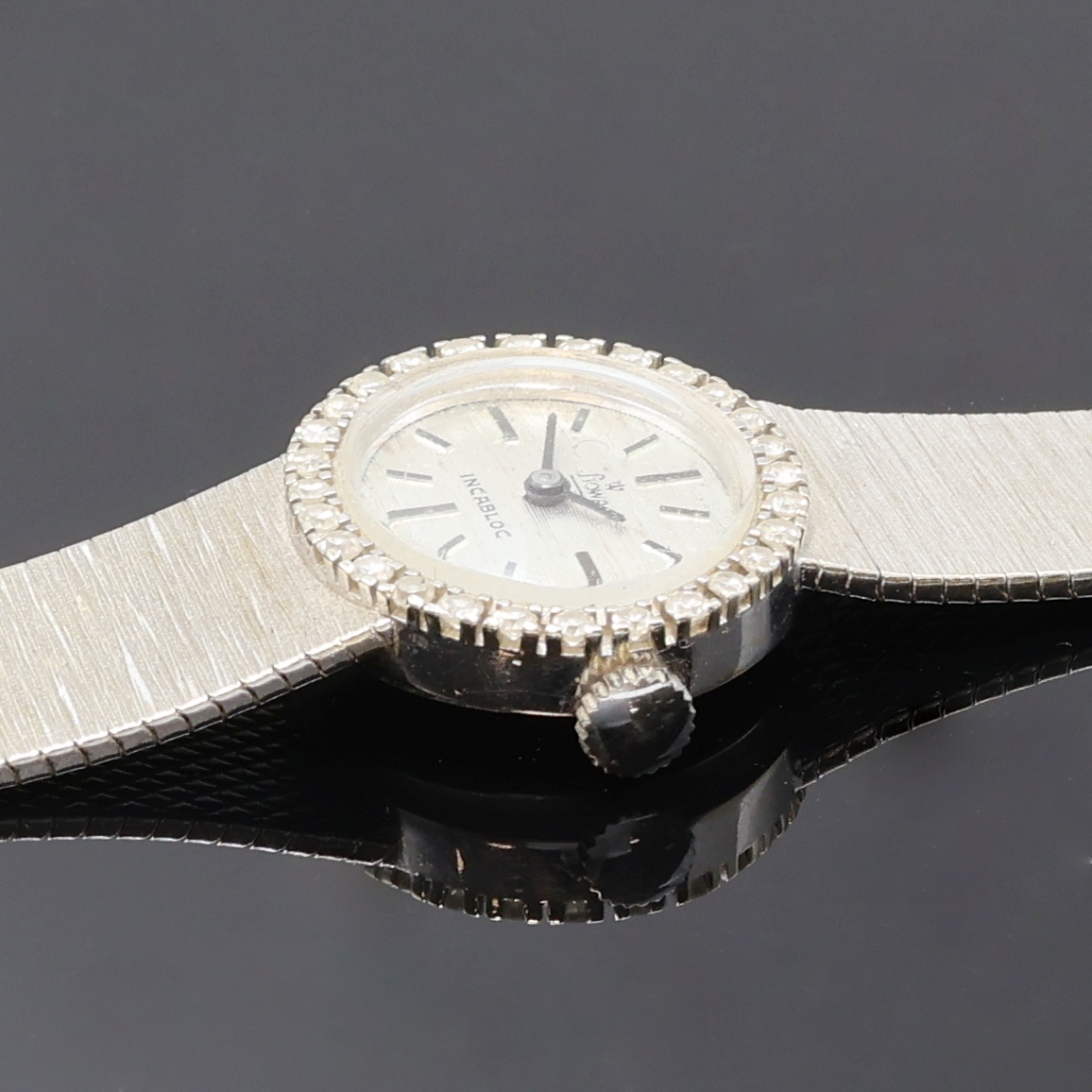 Detail c: STOWA Damenarmbanduhr in WG 750/000 mit Diamanten, Deutschland/Schweiz um 1965, Handaufzug, Goldband, Boden aufgedr., Lünette aufw. m. Diamanten ...
