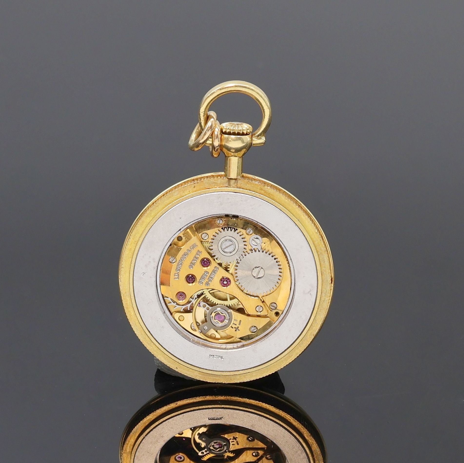 Detail c: CHOPARD offene Damentaschenuhr in GG 750/000, Schweiz um 1970, Handaufzug, geriffelter Rand, floral grav. Boden aufgedr., Zifferbl. floral grav. m. ...