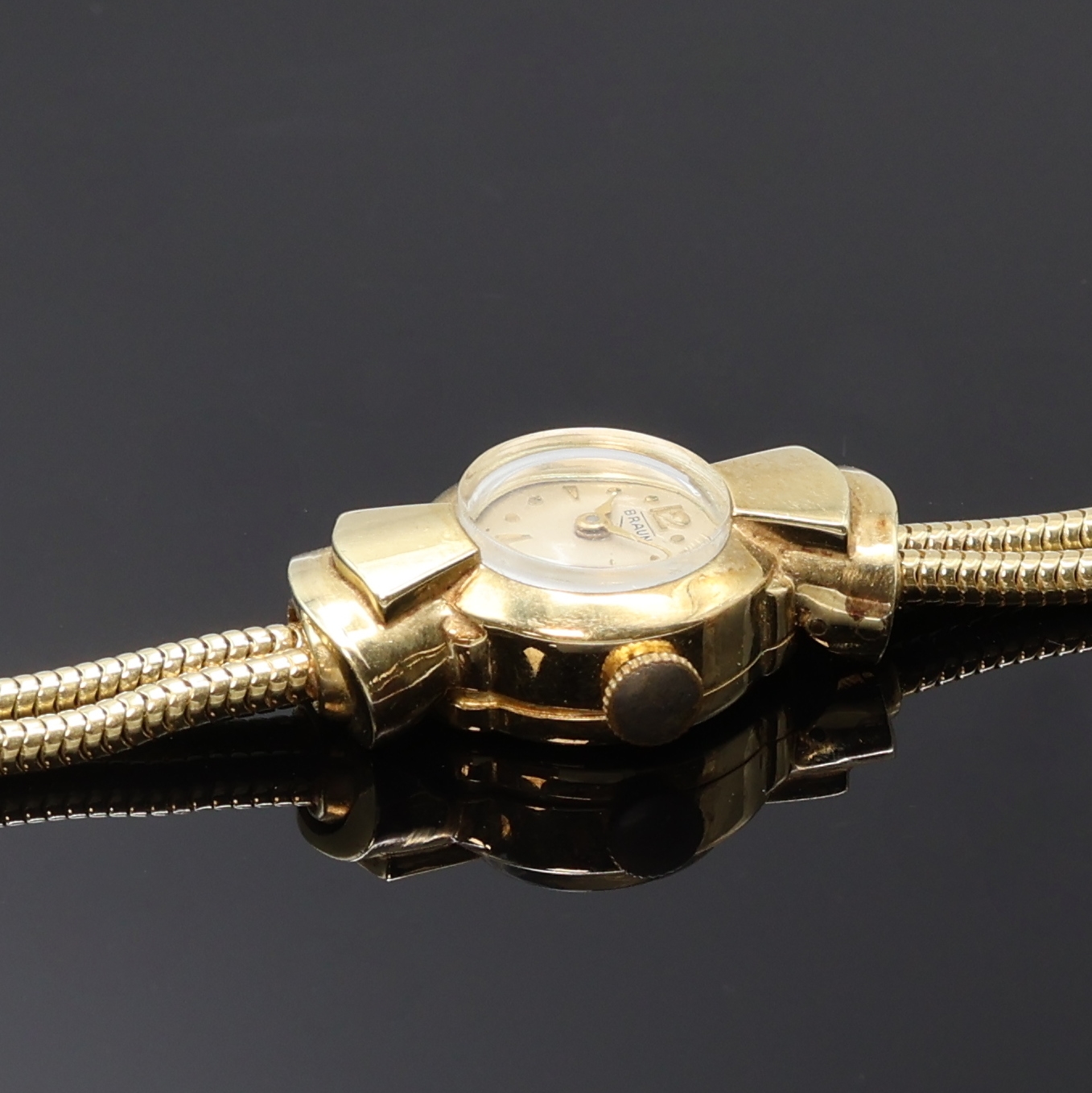 Detail c: BRAUN Damenarmbanduhr in GG 585/000, Schweiz um 1955, Handaufzug, 2-teil. Geh., Scharnierboden, silb. Zifferbl. pat., gold. Indizes und Zeiger, ...