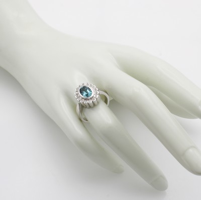 27087782c - Ring mit Aquamarin und Diamanten, WG 585/000, Aquamarin ca. 1 ct umgeben v. Diam. zus. ...