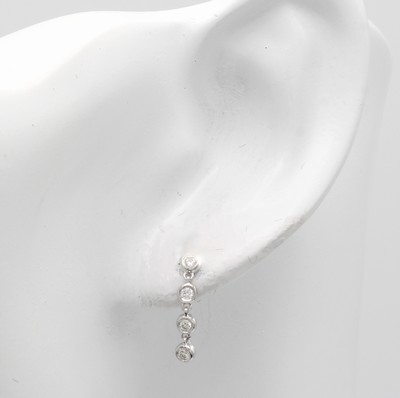 27088567a - Paar Ohrstecker mit Brillanten, WG 585/000, 8 Brill. zus. ca. 0.22 ct feines Weiß/vs-si ...