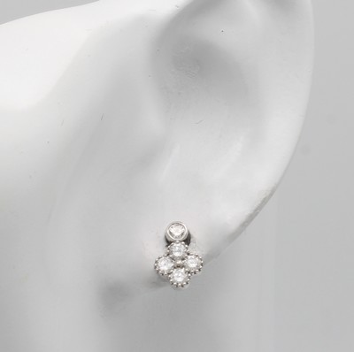 27088576a - Paar Ohrstecker mit Brillanten, WG 750/000, 10 Brill. zus. ca. 0.72 ct Weiß/vs ...