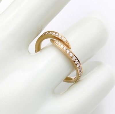 27091057a - Ring mit Brillanten, RG 750/000, offen u. versetzt gearb., Brill. zus. ca. 0.34 ct ...