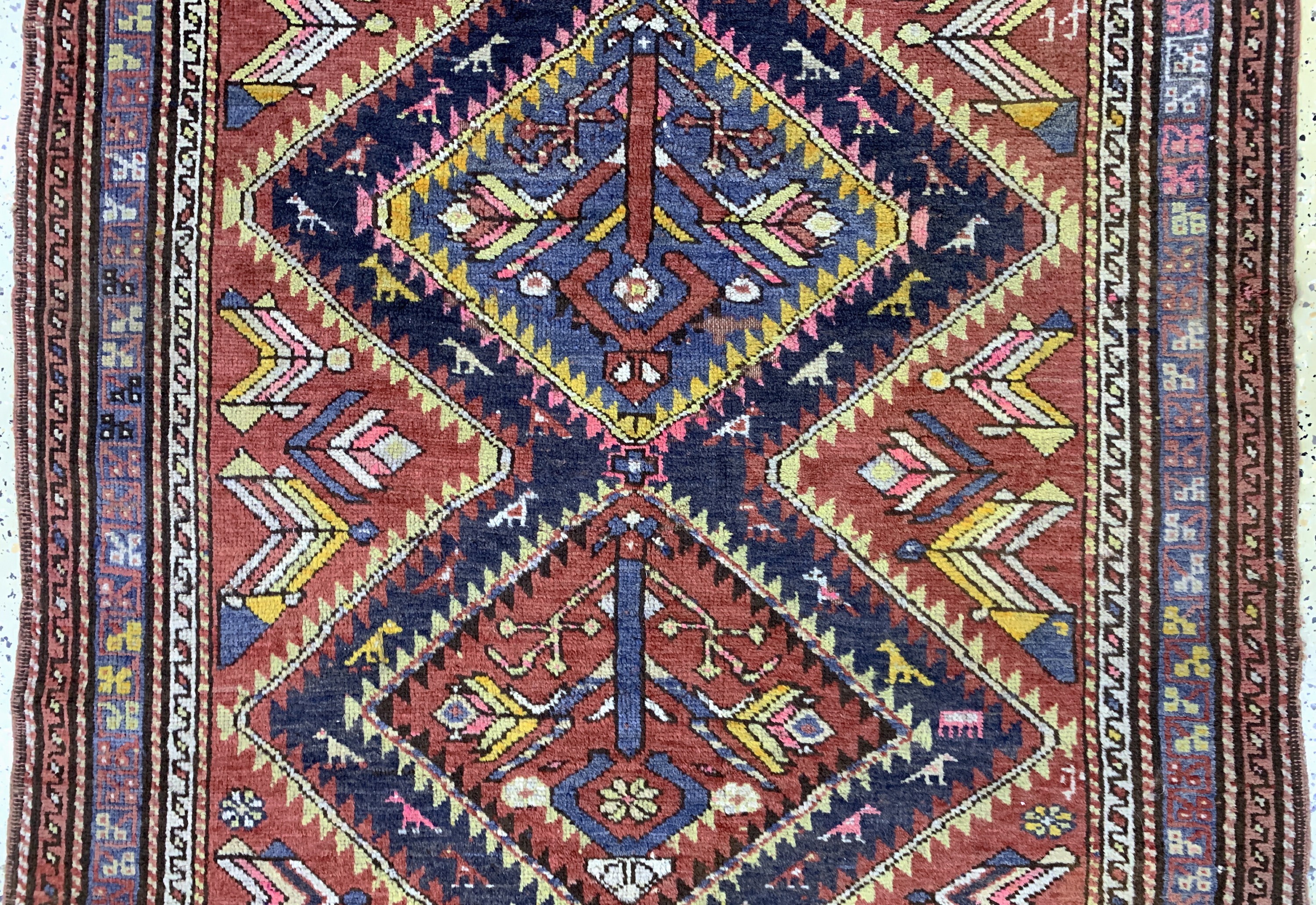 Detail b: Kazak alt, Kaukasus, Anfang 20.Jhd, Wolle auf Wolle, ca. 230 x 125 cm, Mottenfraß, EHZ: 2