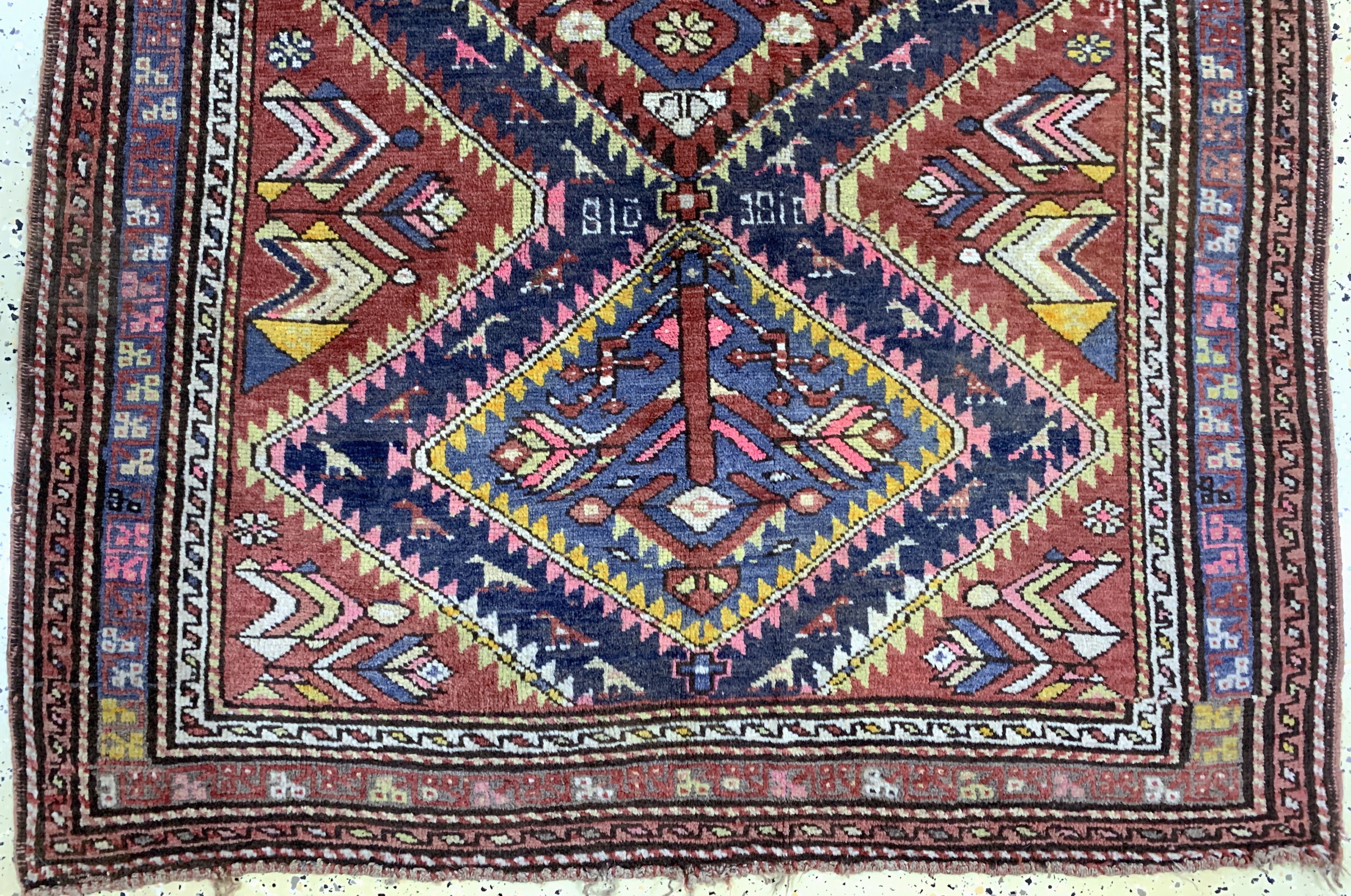 Detail c: Kazak alt, Kaukasus, Anfang 20.Jhd, Wolle auf Wolle, ca. 230 x 125 cm, Mottenfraß, EHZ: 2
