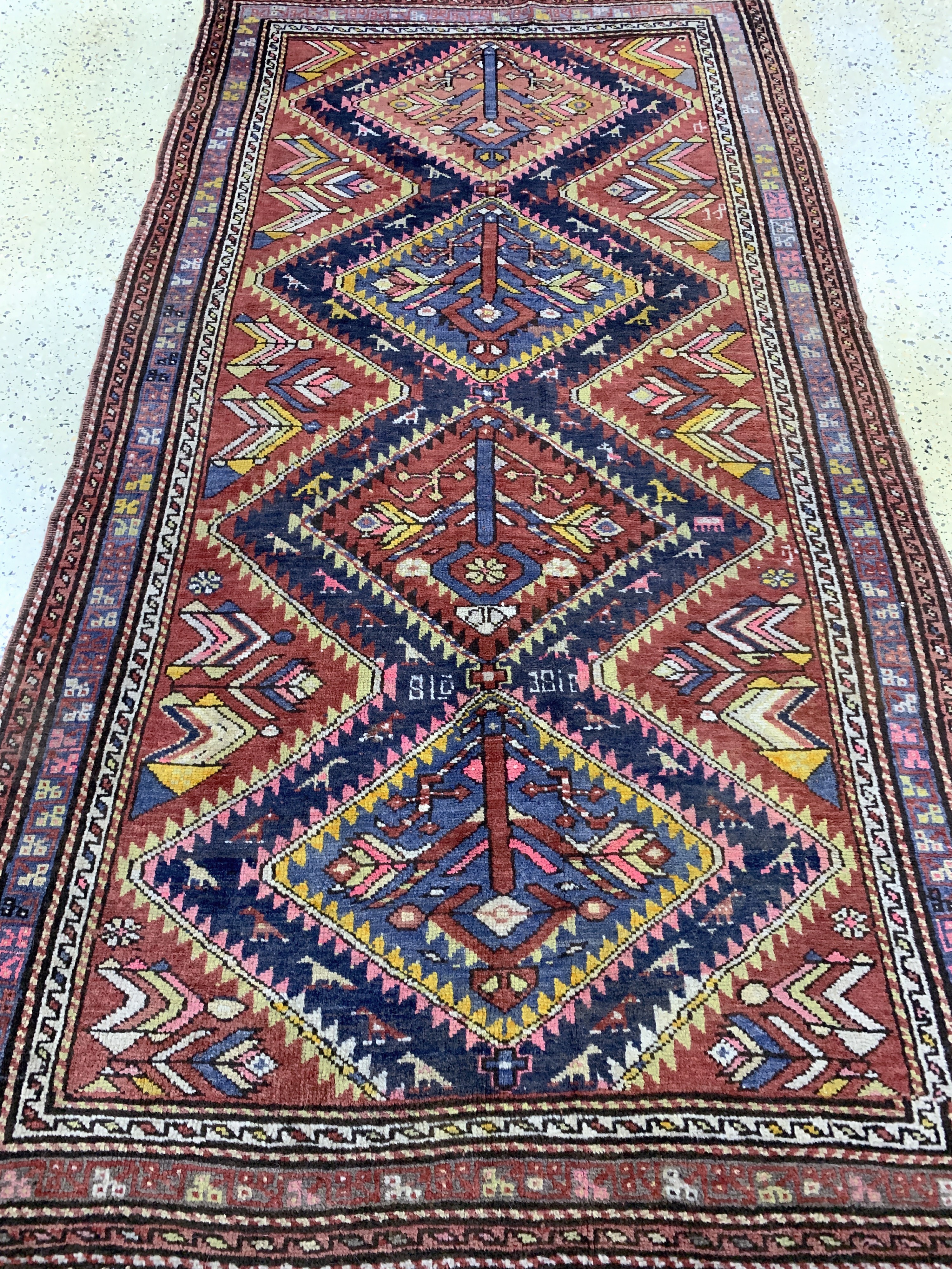Detail d: Kazak alt, Kaukasus, Anfang 20.Jhd, Wolle auf Wolle, ca. 230 x 125 cm, Mottenfraß, EHZ: 2