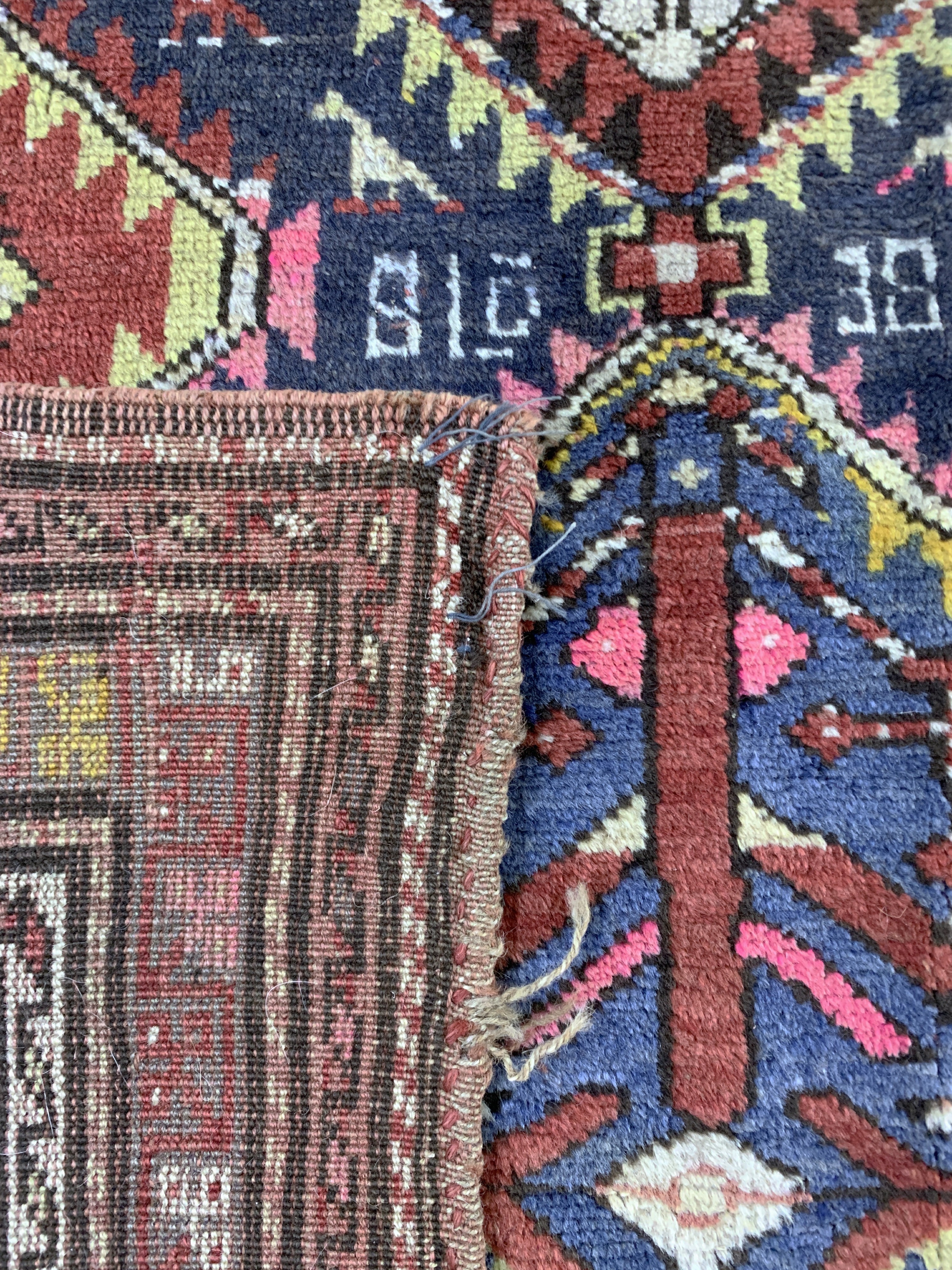 Detail e: Kazak alt, Kaukasus, Anfang 20.Jhd, Wolle auf Wolle, ca. 230 x 125 cm, Mottenfraß, EHZ: 2