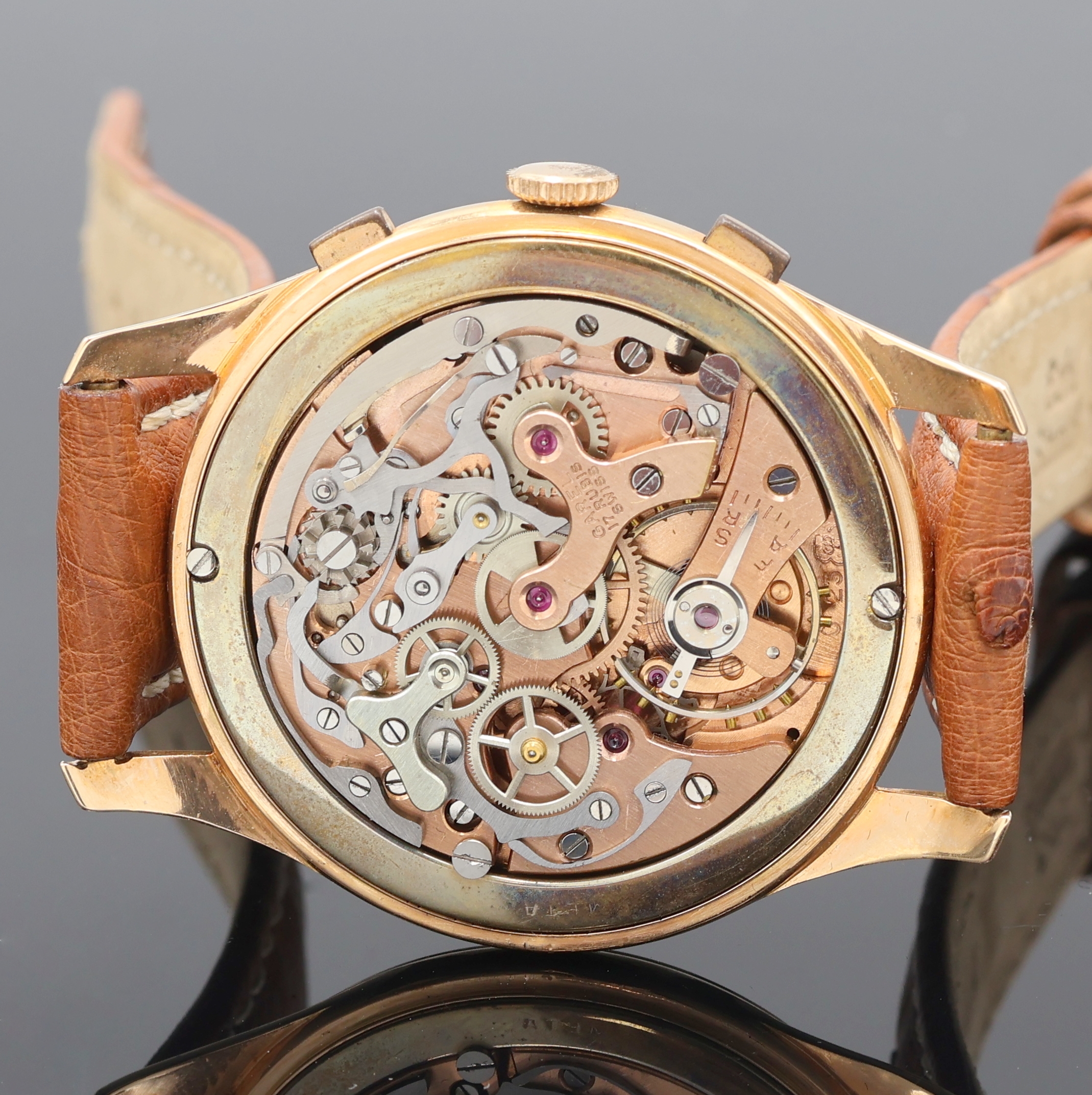 Detail e: GAREL Schaltradchronograph Kaliber Valjoux 23 in RG 750/000, Schweiz um 1950, Handaufzug, 3-teil. Geh., Boden (dell.) und Glasrand aufgedr., silb. ...