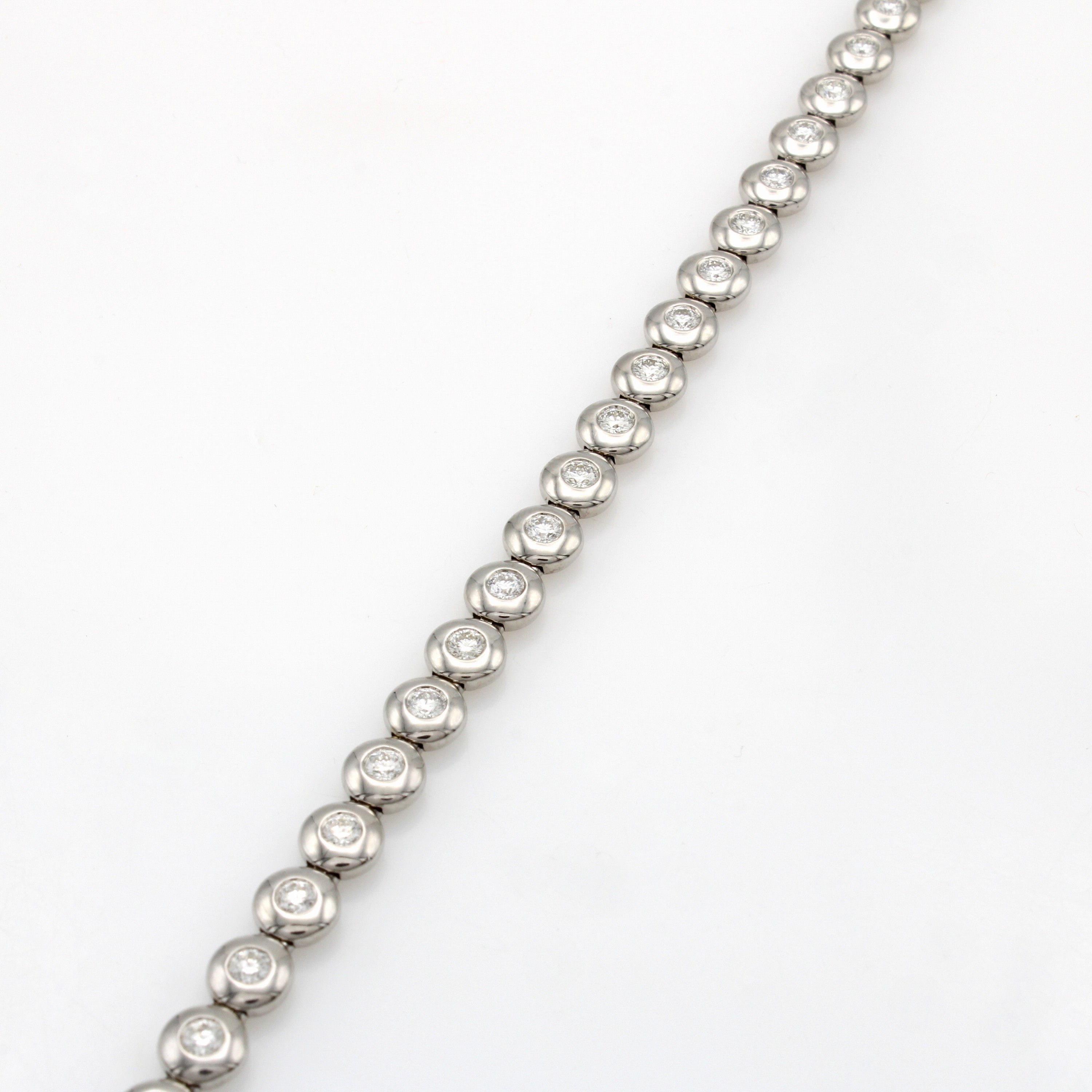Image 27091495 - Tennisarmband mit Brillanten, WG 750/000, 29 Brill. in breiten, glatten Fassungen zus. ...