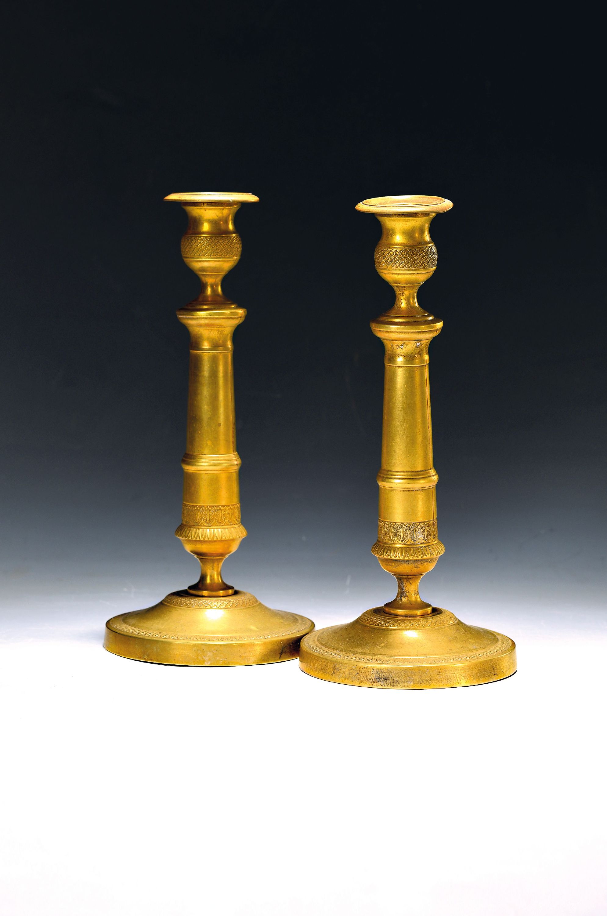 Image 27091877 - Pair of Empire candlesticks, France, first half of the 19th century, brass, richly ...