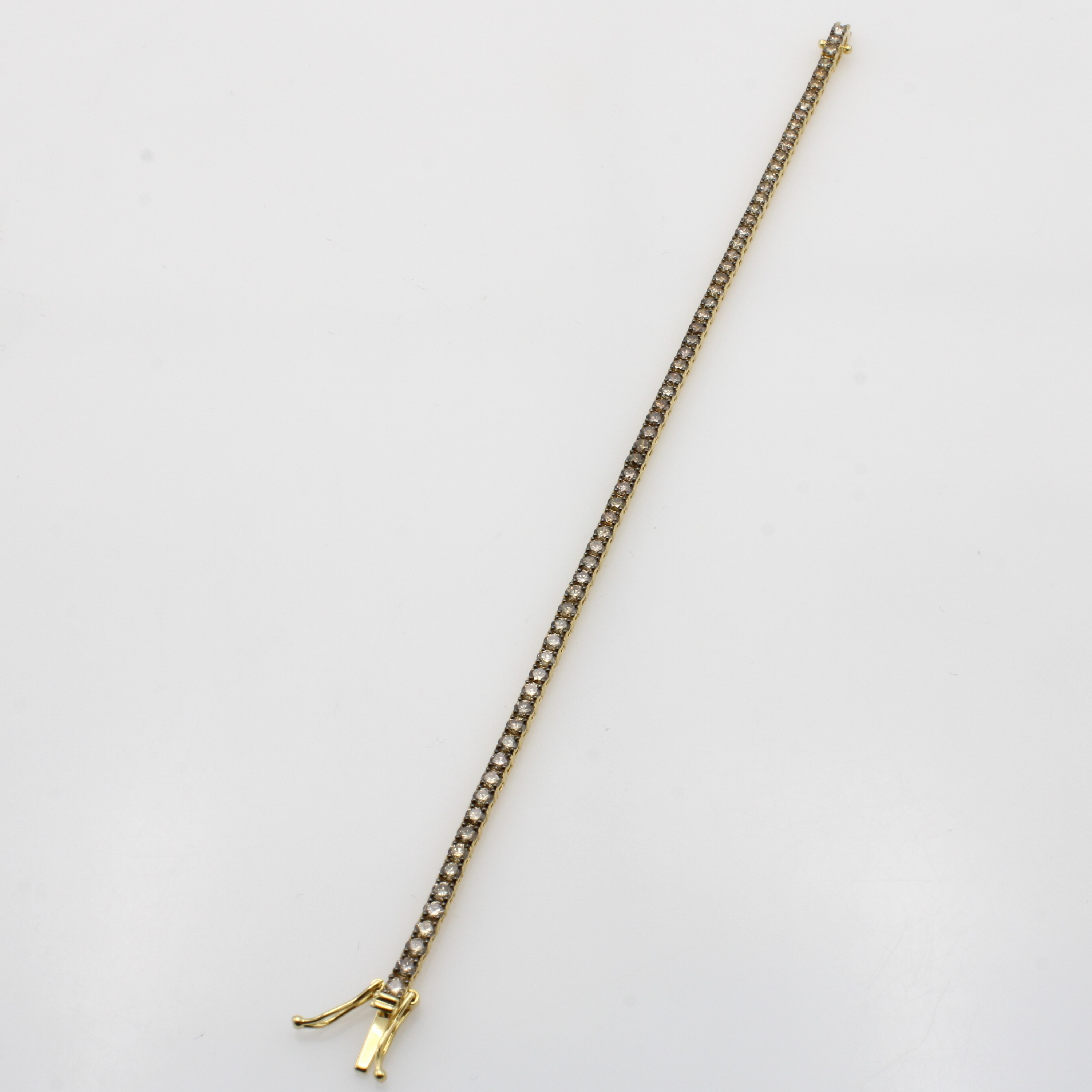 Image 27092405 - Tennisarmband mit Diamanten, GG 750/000, 69 Diam. zus. ca. 3.66 ct Braun/vs, Kastenschl. ...