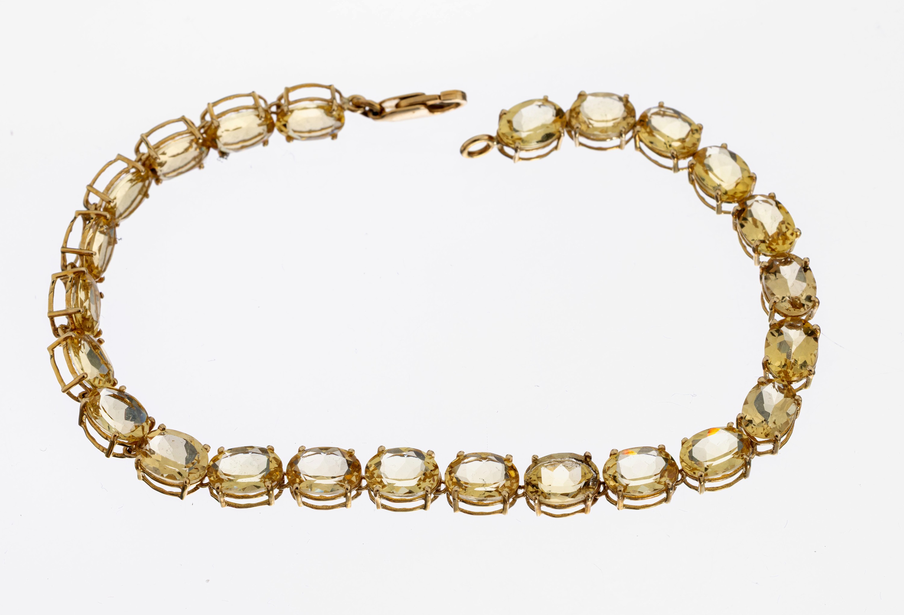 Detail a: 14 kt Gold Citrin-Armband, GG 585/000, 24 ovalfacett. Citrine zus. ca. 12.0 ct, L. ca. 19.5 cm, Karabinerschließe, ca. 7.6 g