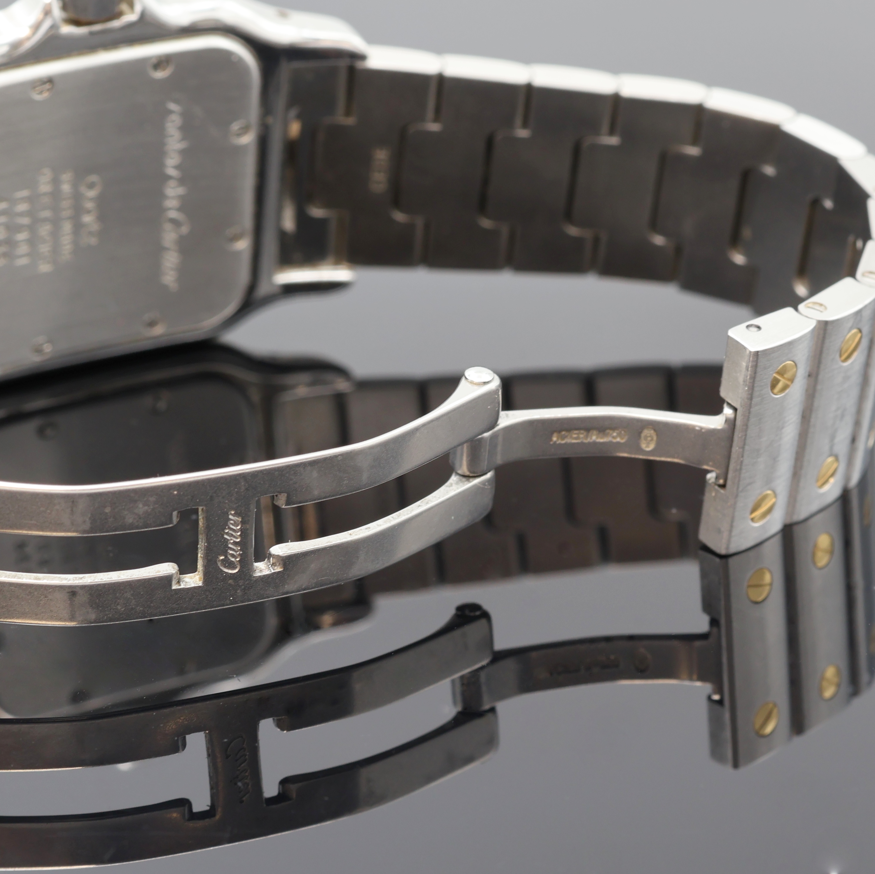 Detail e: CARTIER Santos Armbanduhr Referenz 187901, Schweiz um 1995, quarz, Edelstahl/Gold komb. inkl. orig. Gliederband m. dopp. Faltschl., Schmuckkrone, ...