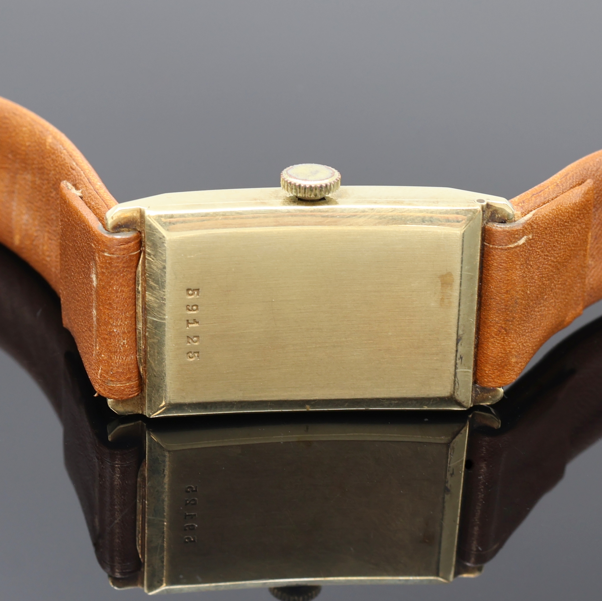 Detail c: IWC Armbanduhr in GG 585/000, Schweiz um 1937, Handaufzug, neutr. Scharniergeh., Zifferbl. pat./besch., arab. Zahlen, gold. Zeiger, kl. Sek. b. 6, ...