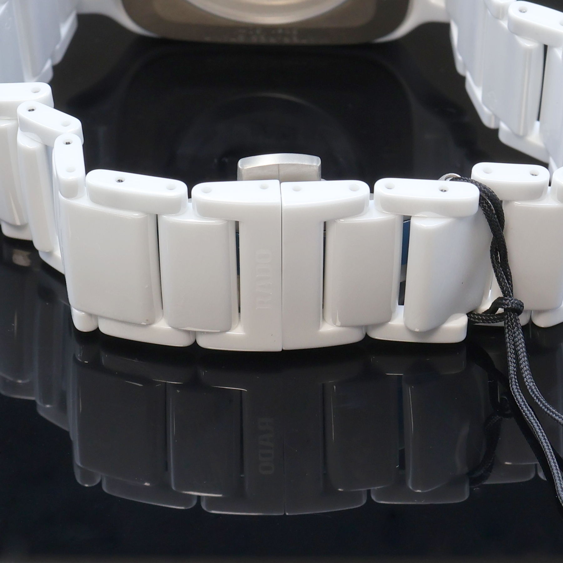 Detail c: RADO nahezu neuwertige Armbanduhr True Square Open Heart Referenz R27073702, Automatik, Schweiz um 2024, Keramikgeh. inkl. Gliederband m. dopp. ...