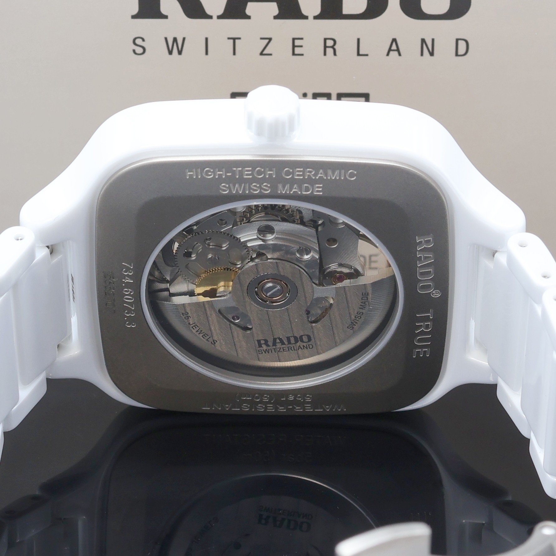 Detail e: RADO nahezu neuwertige Armbanduhr True Square Open Heart Referenz R27073702, Automatik, Schweiz um 2024, Keramikgeh. inkl. Gliederband m. dopp. ...