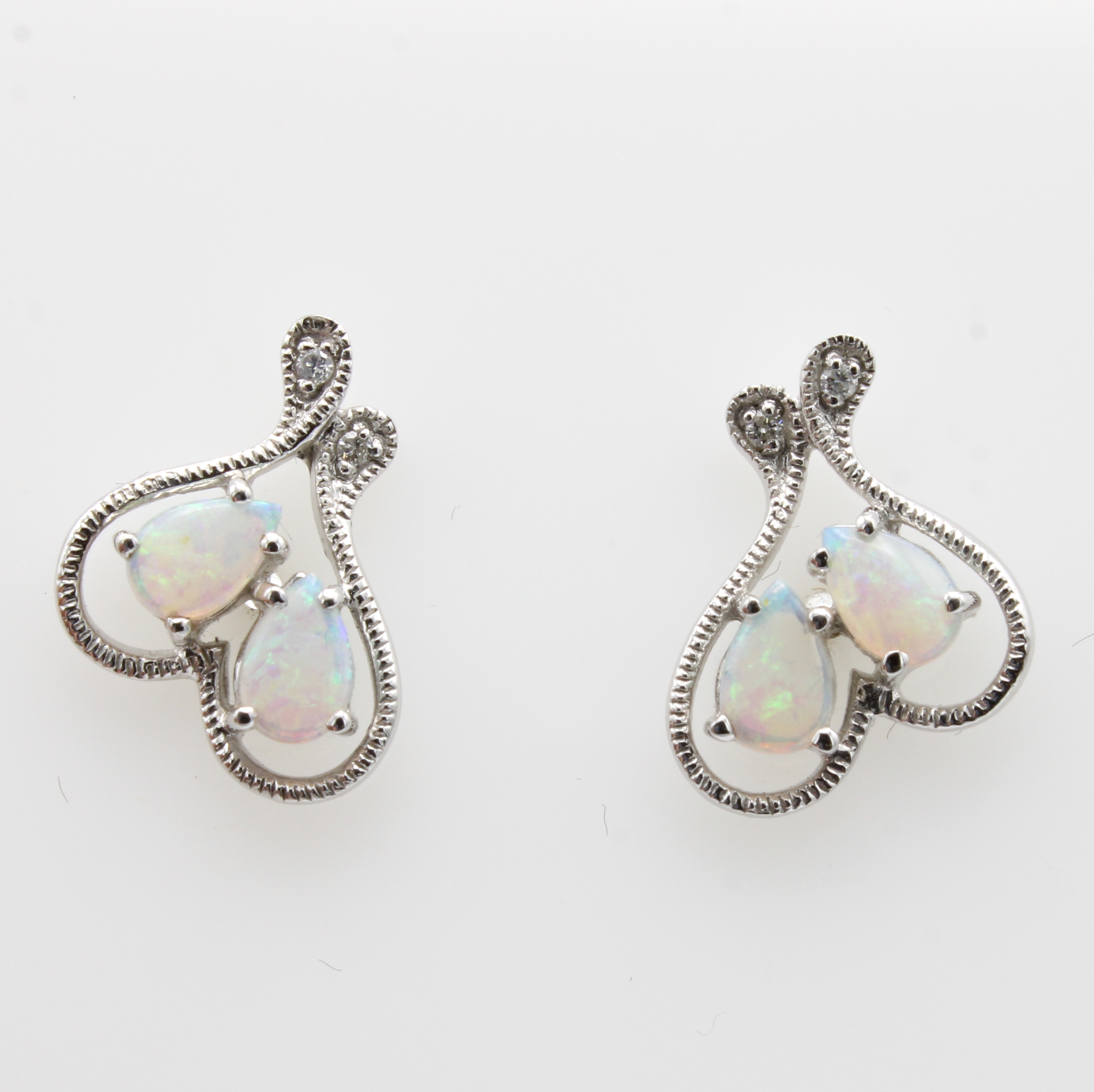Image 27097149 - Paar Ohrstecker mit Opalen und Brillanten, WG 750/000,4 Opale zus. ca. 0.85 ct, 4 Brill. ...