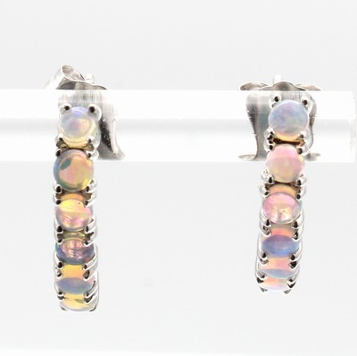 27097142a - Paar Ohrstecker mit Opalen, WG 750/000, 12 Opale zus. ca. 0.72 ct Schätzpreis: 1550, - ...