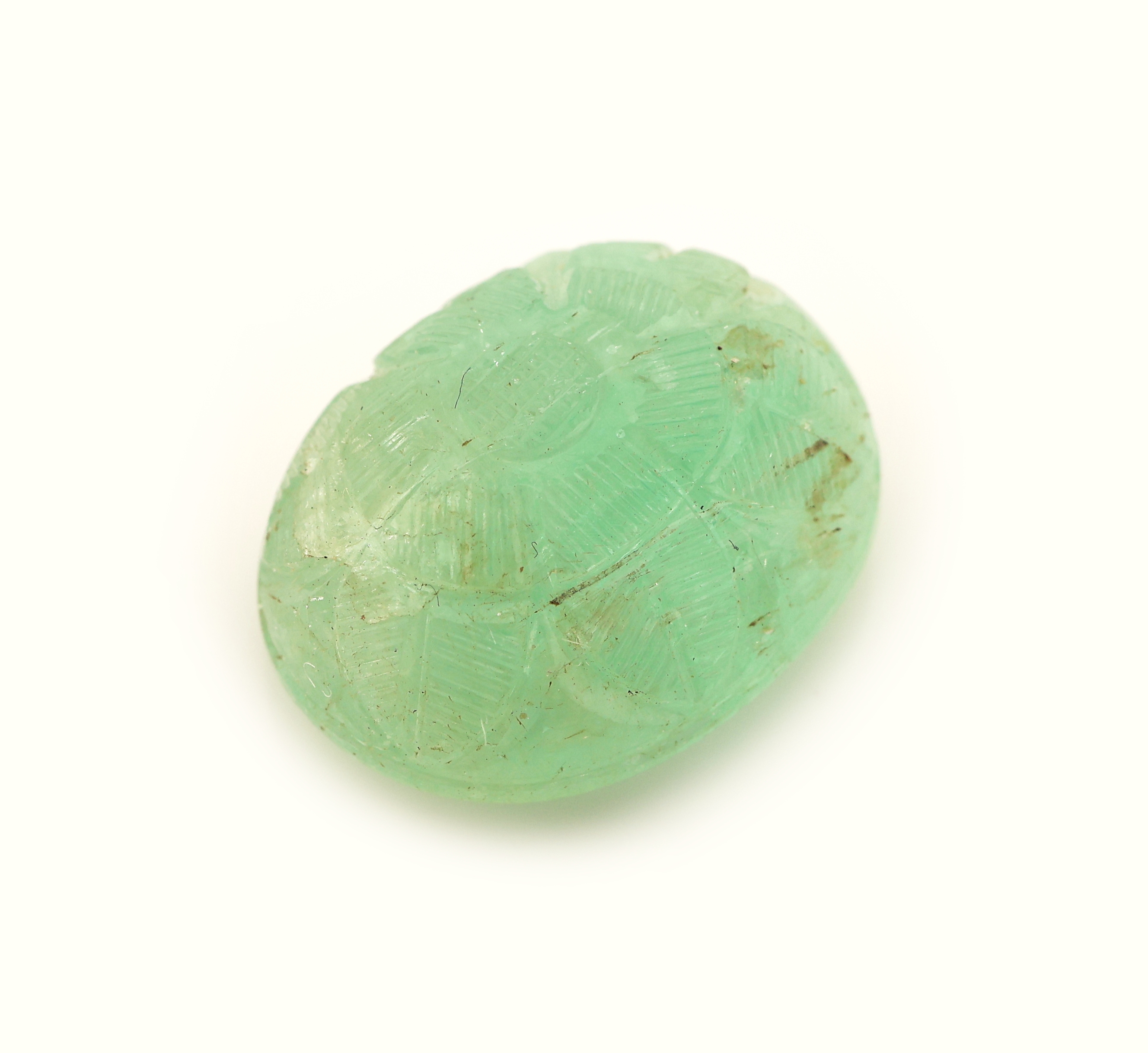 Image 27098670 - Loser Smaragd, ca. 19.93 ct, ovaler Cabochon umlaufend floral graviert, ca. 19.28 x 15.06 ...