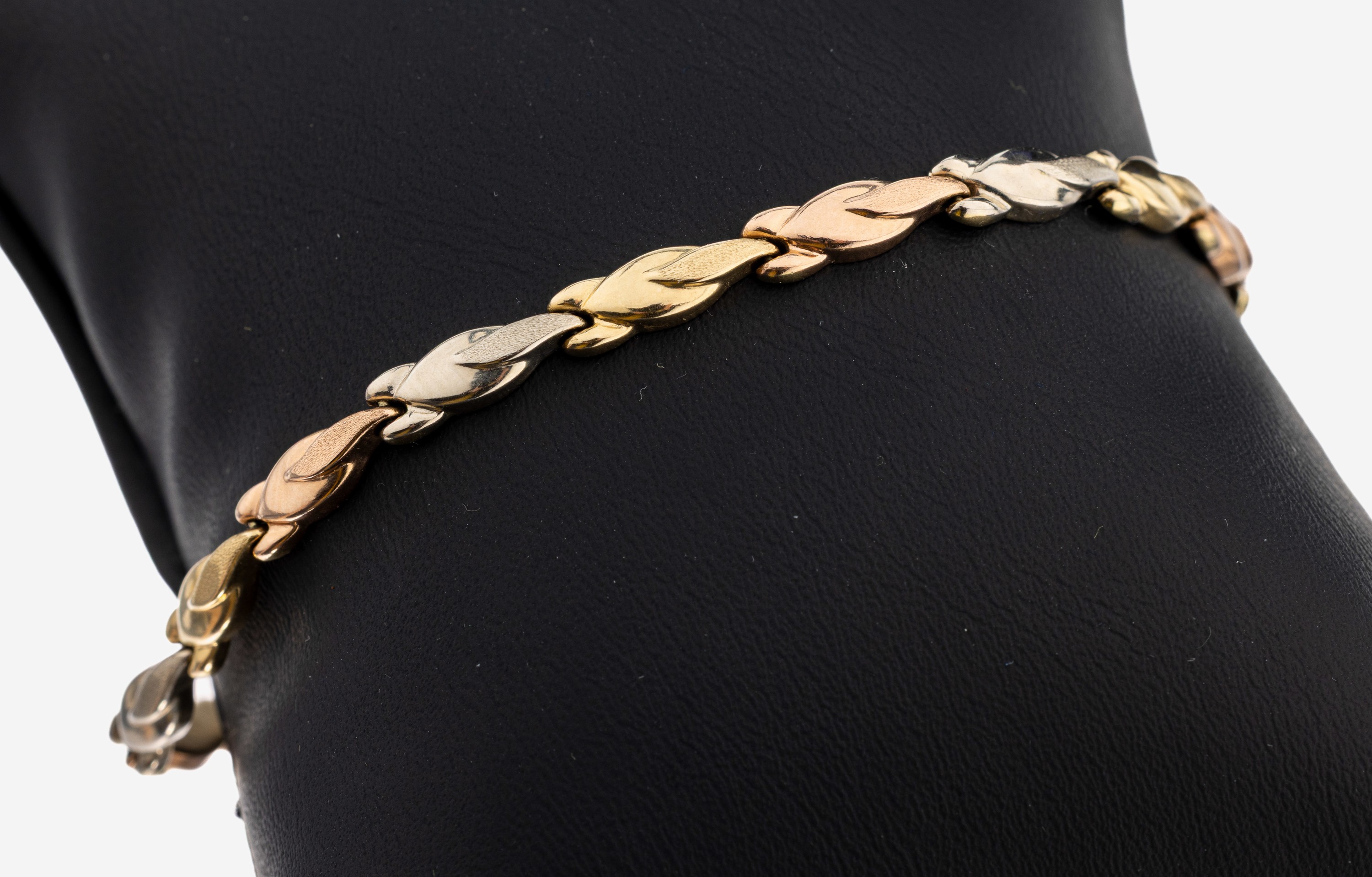 Image 27102437 - 14 kt Gold Armband, GG/WG/RG 585/000, abstrakte Glieder im Farbwechsel, L. ca. 19 cm, ...