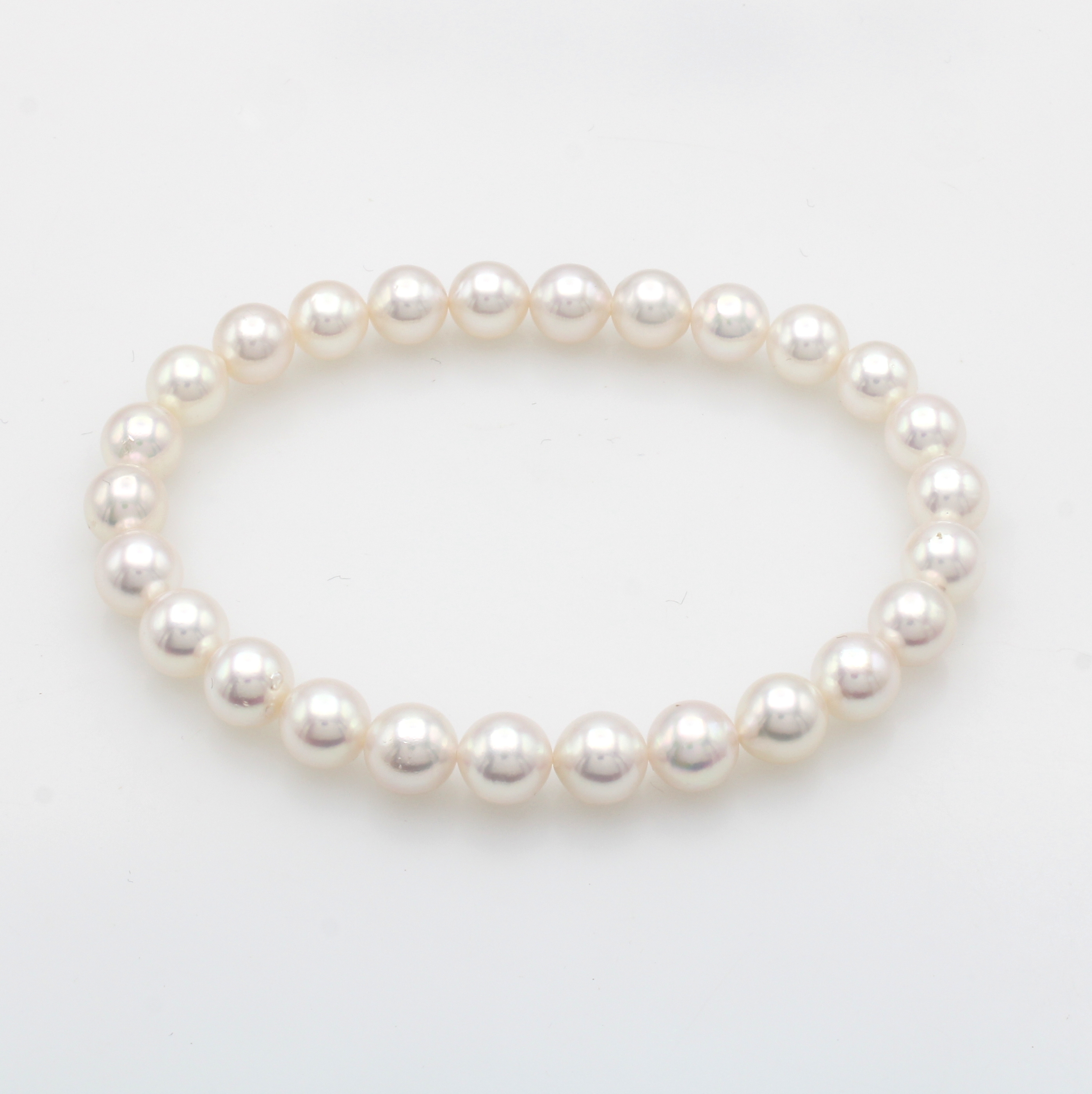 Image 27103578 - Elastisches Akoyazuchtperlenarmband, weiße Perlen ca. 7-7.5 mm Schätzpreis: 1100, - EUR