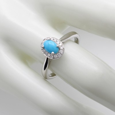 27103590a - Ring mit Türkis und Brillanten, WG 750/000, ovaler Türkiscabochon, 16 Brill. zus. ca. ...