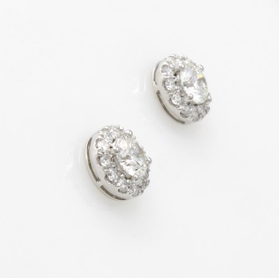 27103665a - Paar Ohrstecker mit Brillanten, WG 750/000, 2 Brill jeweils mittig gef. zus. ca. 1.00 ct ...