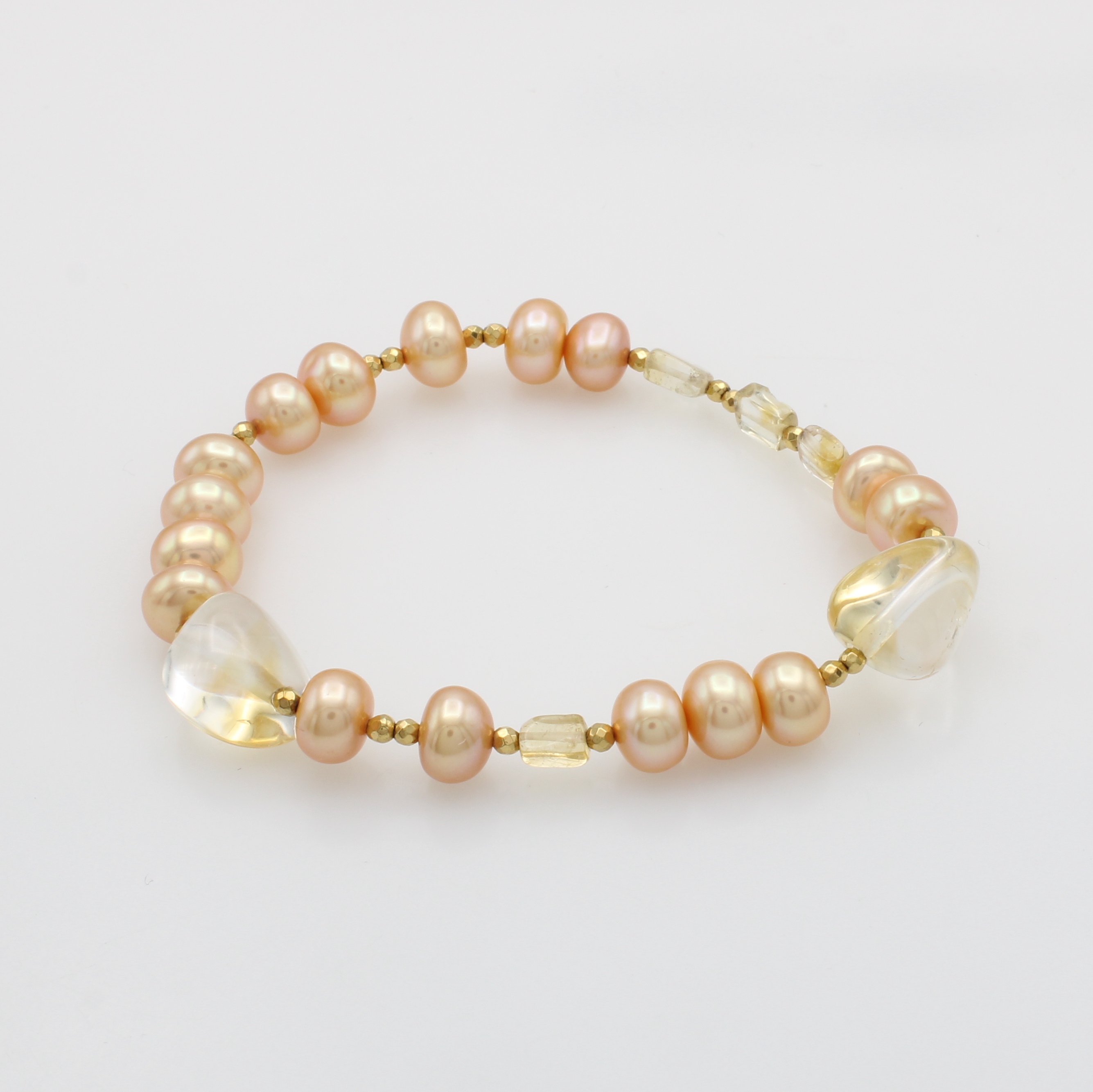 Image 27103716 - Elastisches Süßwasserzuchtperlenarmband mit Citrinen, bouttonf., aprikotf. Perlen, ...