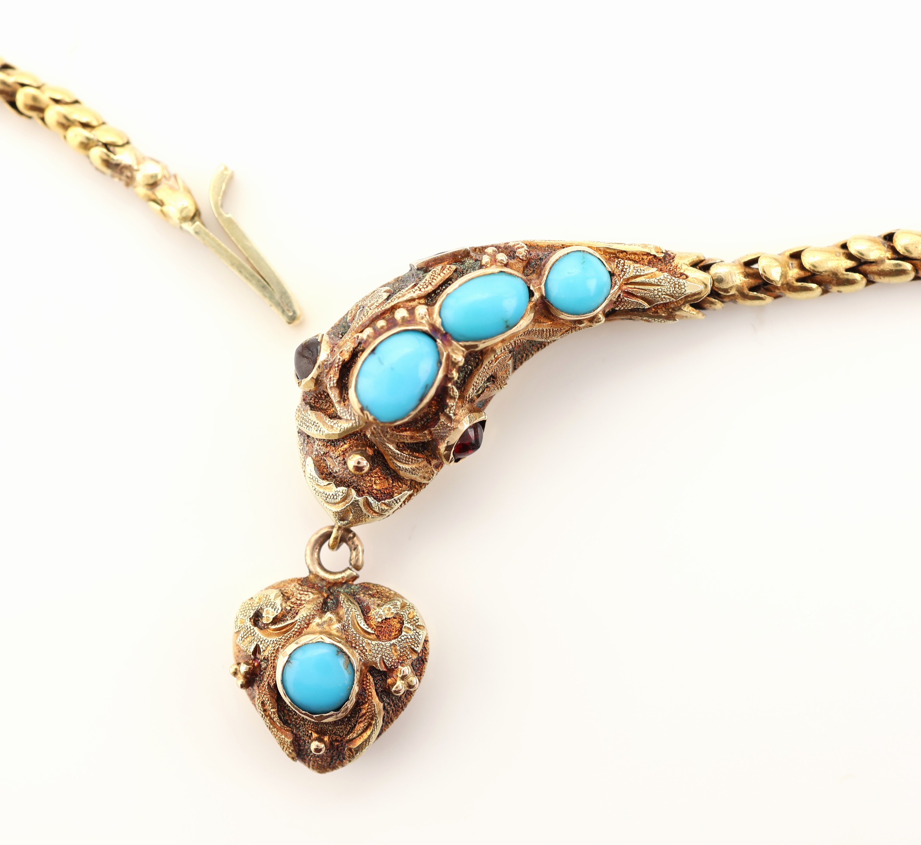 Detail b: 14 kt Gold Türkis-Schlangencollier, um 1860, GG 585/000 gepr., Mittelteil in Form eines Schlangenkopfes, bewegl. herzf. Abhängung, ...