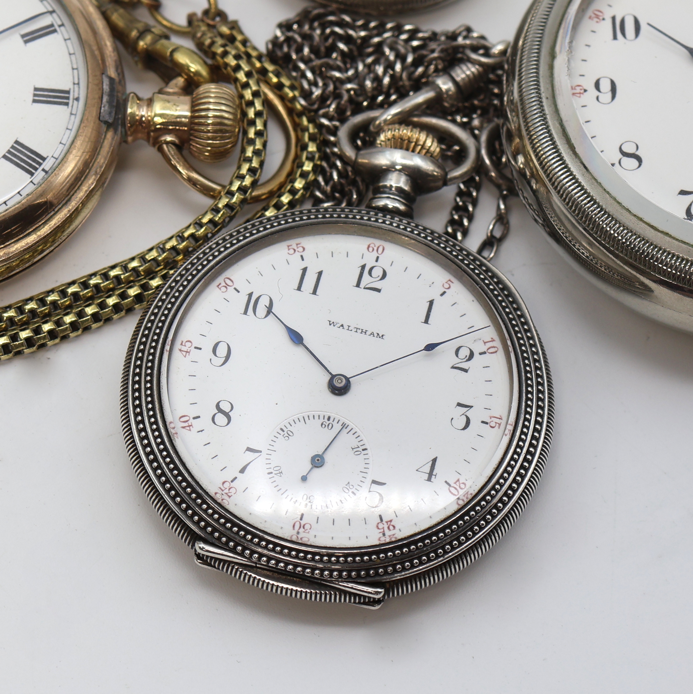Detail c: Konvolut: 4 Amerikanische Taschenuhren, 2x Elgin, 1x Waltham, 1x Addison, USA um 1900, Elgin 1 x Silverode, Werk ausklappbar unter verschr. Lünette, ...