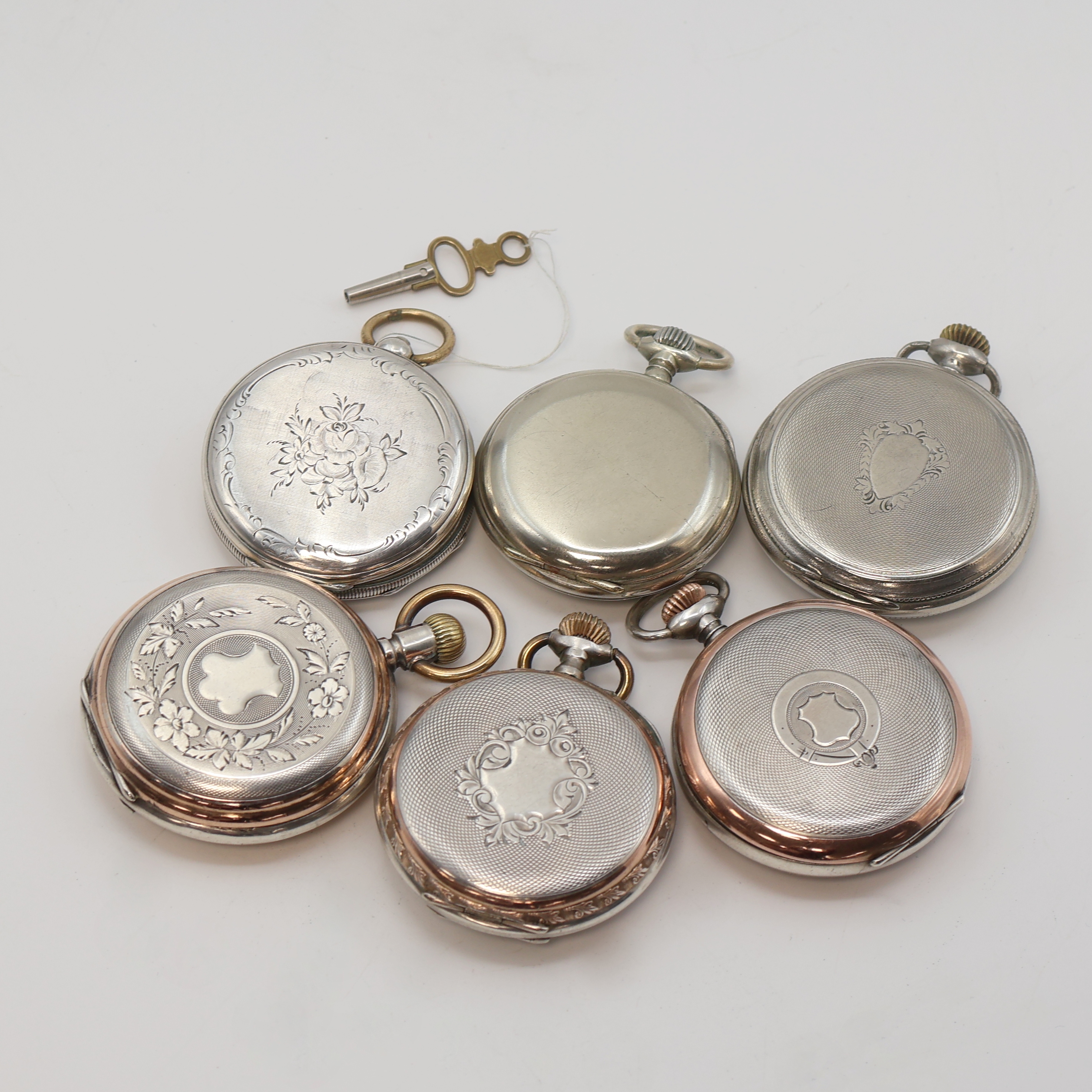 Detail d: 6 Taschenuhren davon 3x Silber und 3x vernickelt, Schweiz um 1880-1915, 1x Schlüsselaufzug, 5x Kronenaufzug, 1x Halbsavonette, 5x offene ...