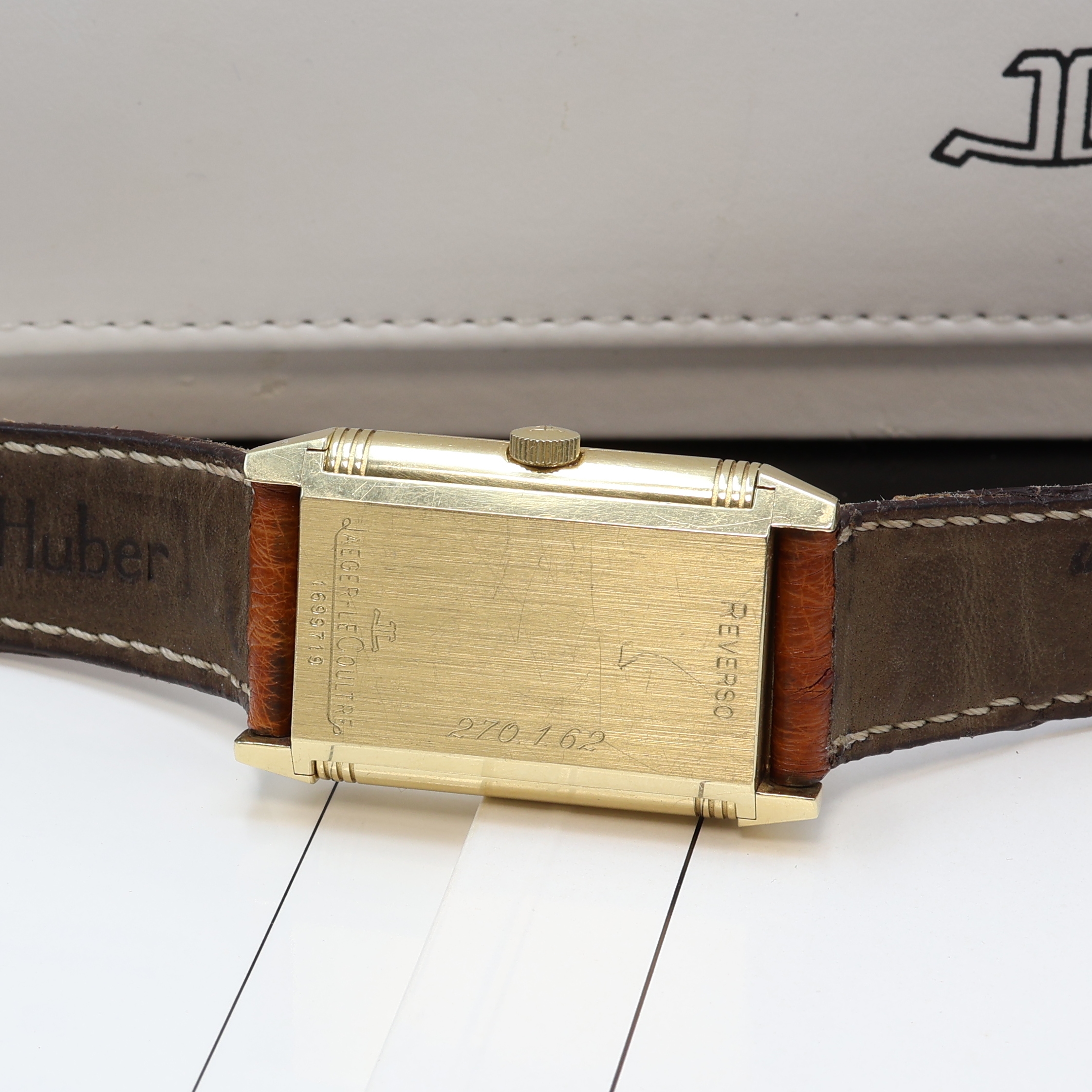 Detail e: Jaeger-LeCoultre Herrenarmbanduhr Reverso Grand Taille in GG 750/000 Referenz 270.1.62, Schweiz verk. lt. beil. Pap. 06/1992, Handaufzug, um 180 Grad ...