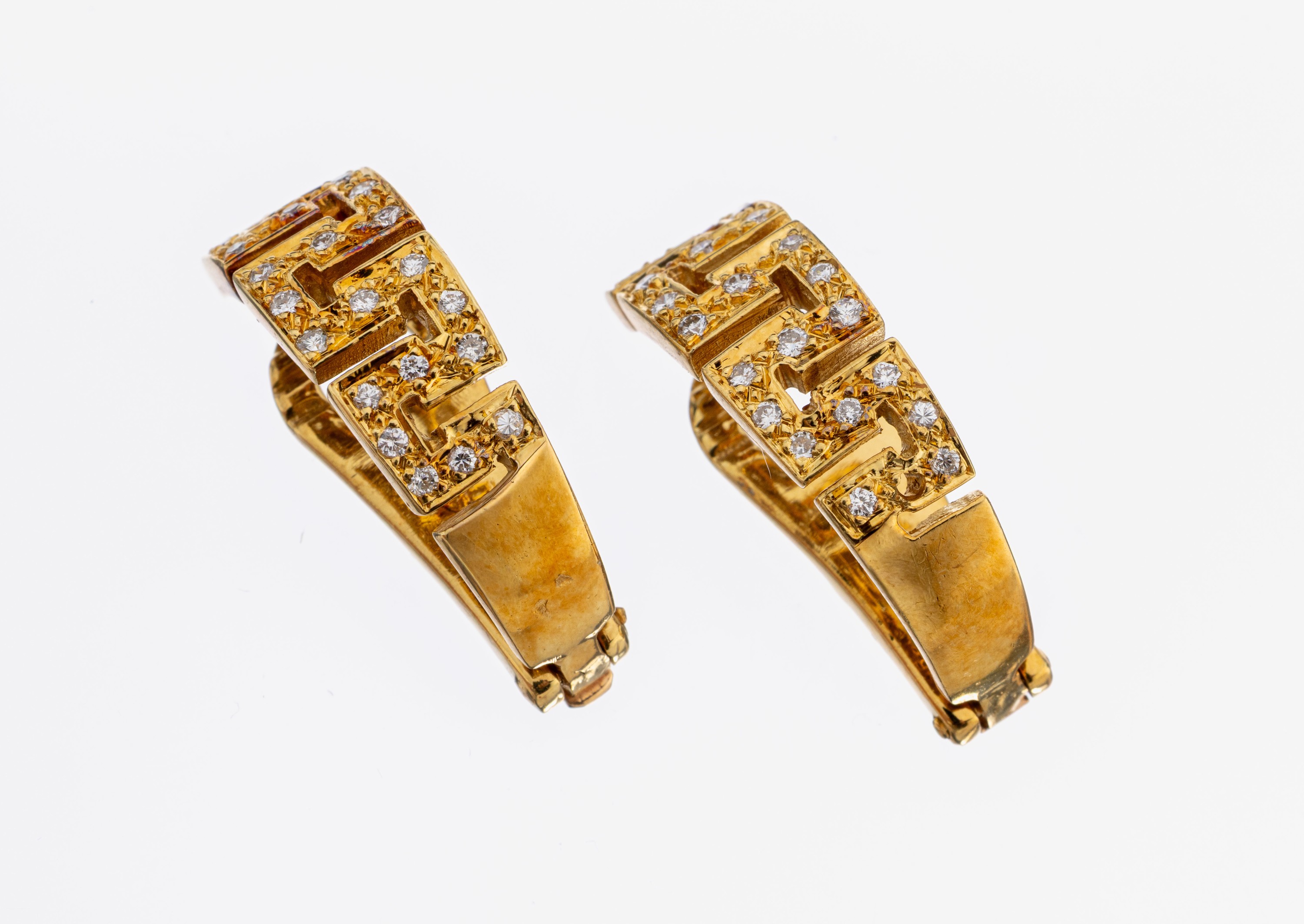 Image 27108340 - Paar 18 kt Gold Brillant-Ohrclips, GG 750/000, Mäanderband, 46 Brillanten zus. ca. ...