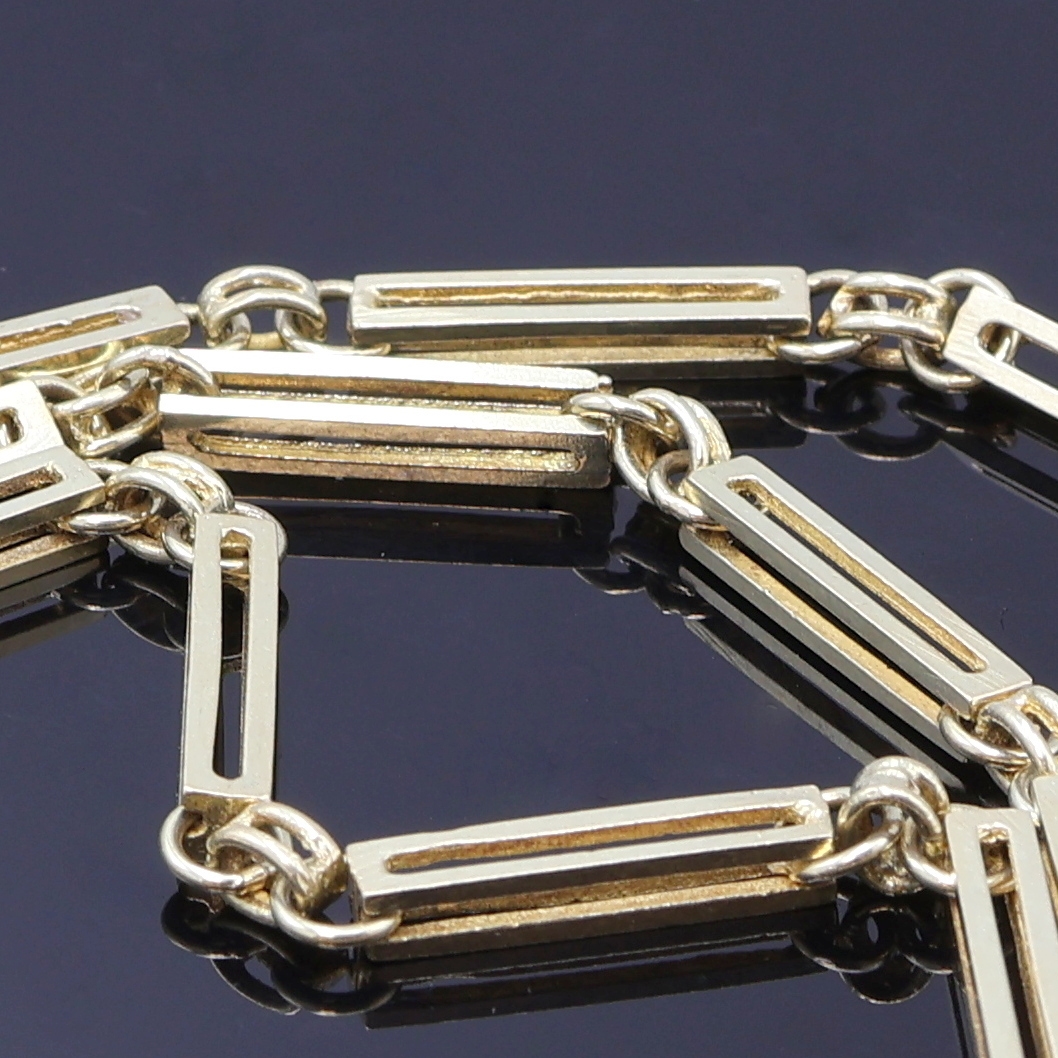 Detail a: Taschenuhrkette in GG 585/000, Karabinerverschluss, L. ca. 48,5 cm, Gew. ca. 20g, in gebrauchsfähigem Zustand