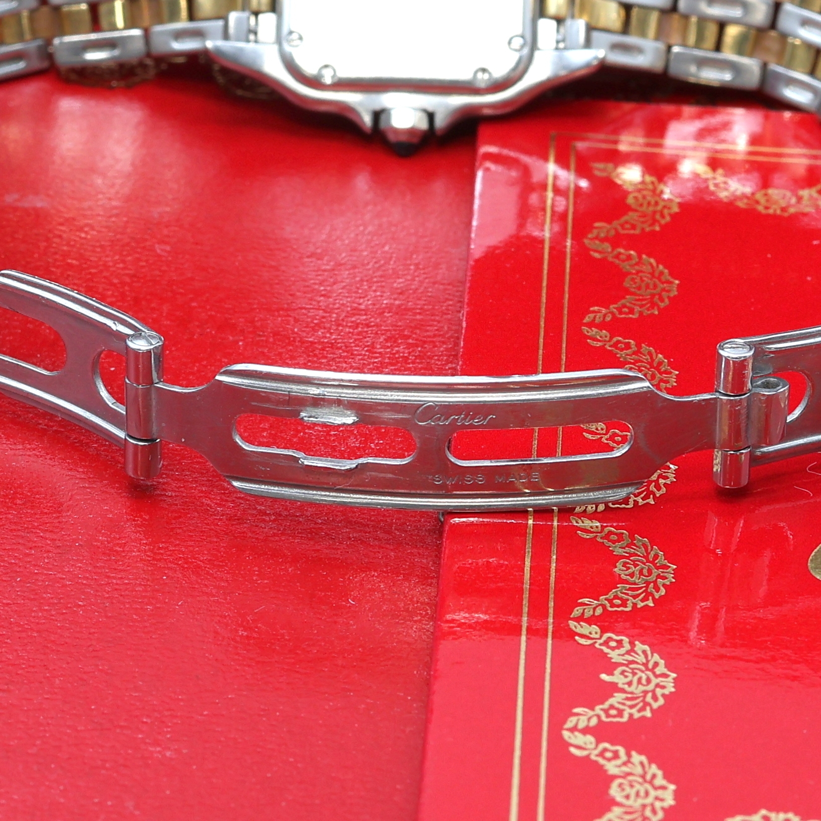 Detail b: CARTIER Panthere Damenarmbanduhr Referenz 166921, Schweiz um 1990, Edelstahl/Gold kombiniert inkl. Gliederband m. dopp. Faltschl., quarz, Boden ...