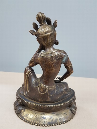 27109224c - Buddha, Tibet, 20th century, bronze, patinated, on a lotus base, one hand supported, ...