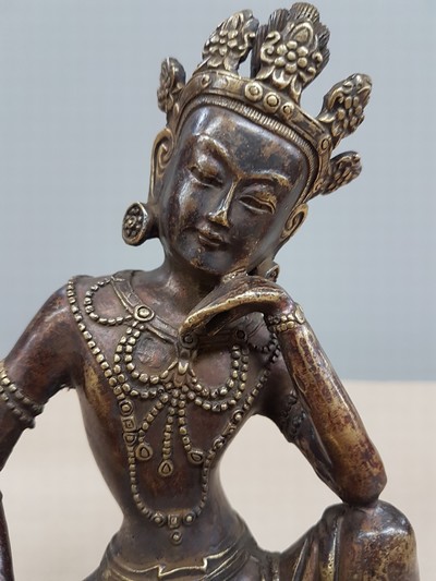 27109224e - Buddha, Tibet, 20th century, bronze, patinated, on a lotus base, one hand supported, ...
