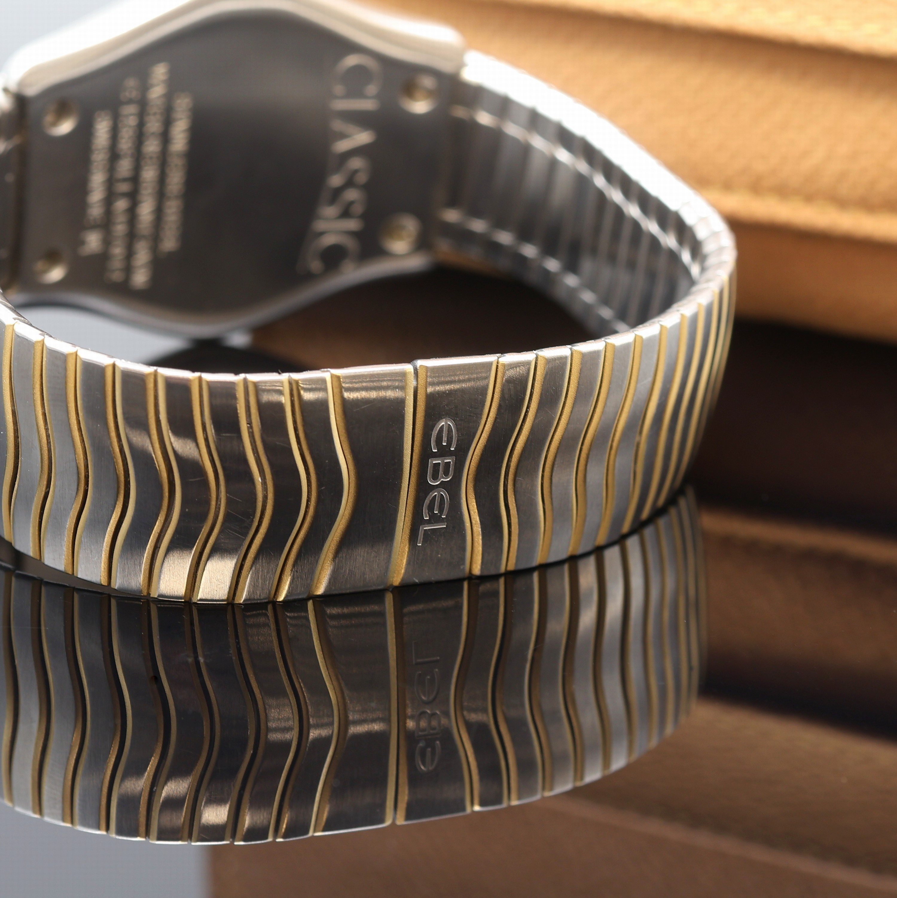 Detail c: EBEL Classic Herrenarmbanduhr Referenz 1255F41.1, Schweiz um 2015, quarz, Edelstahlgeh. inkl. orig. Gliederband m. dopp. Faltschl., GG -Lünette ...